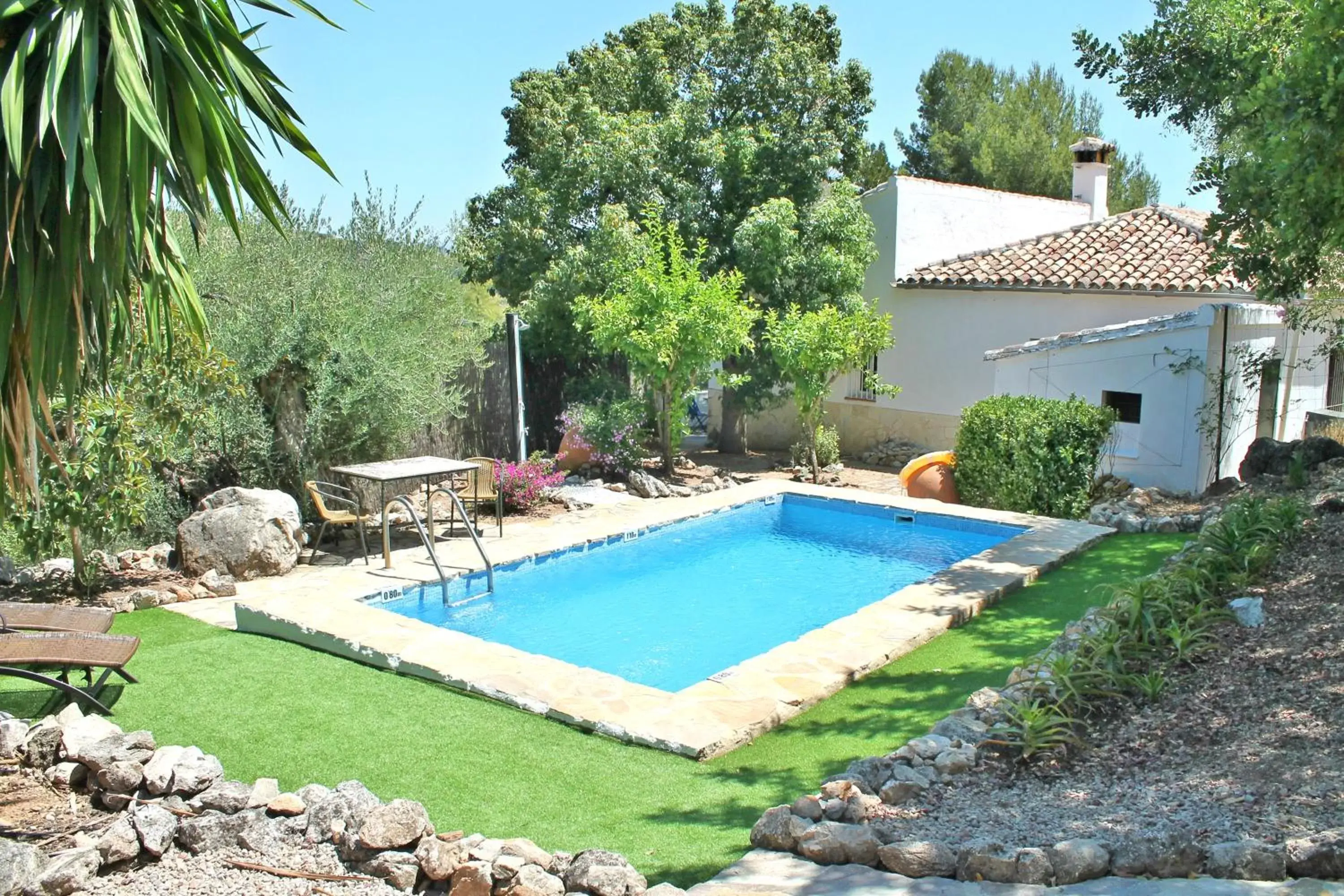 Garden, Swimming Pool in Casas Rurales Los Algarrobales