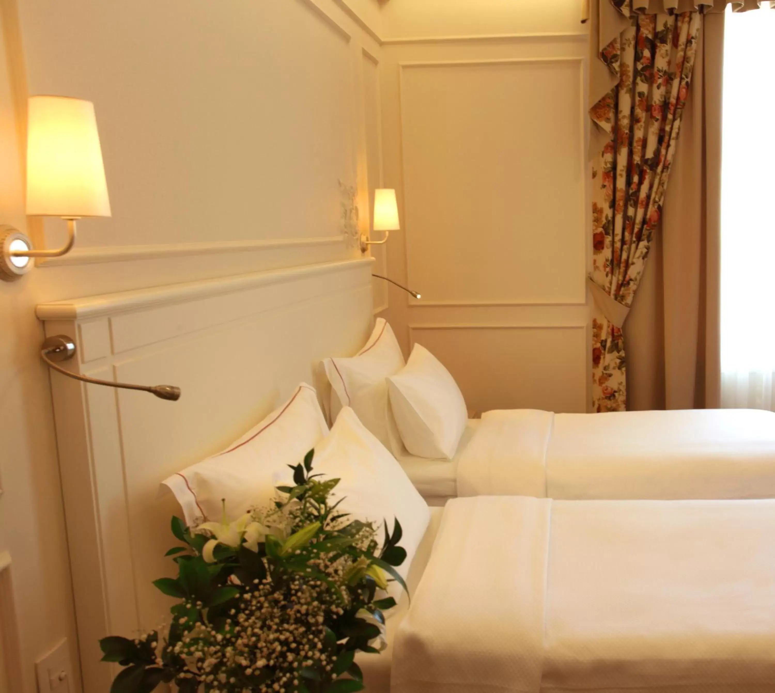 Bed in Corinne Art & Boutique Hotel