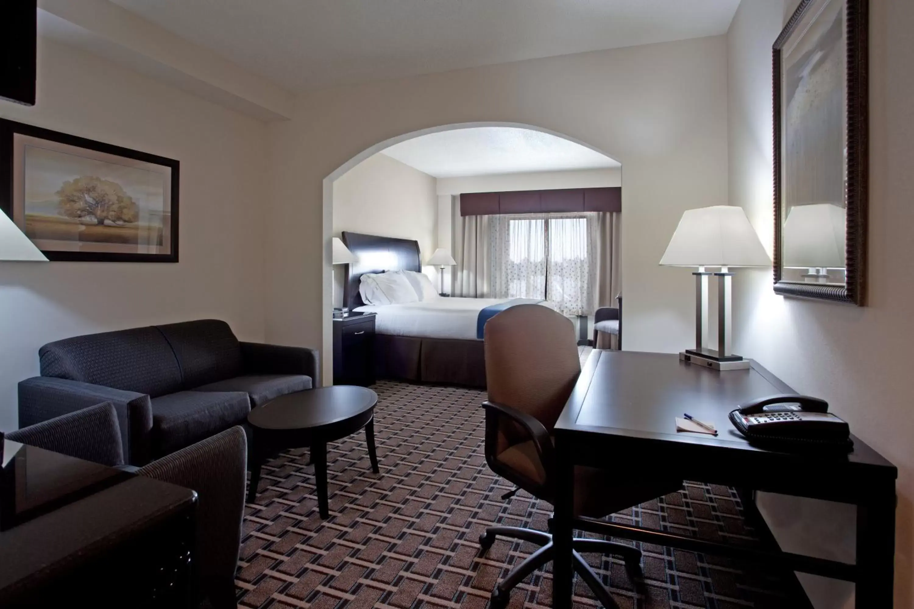 Bedroom, Seating Area in Holiday Inn Express Hotel & Suites Hope Mills-Fayetteville Airport, an IHG Hotel