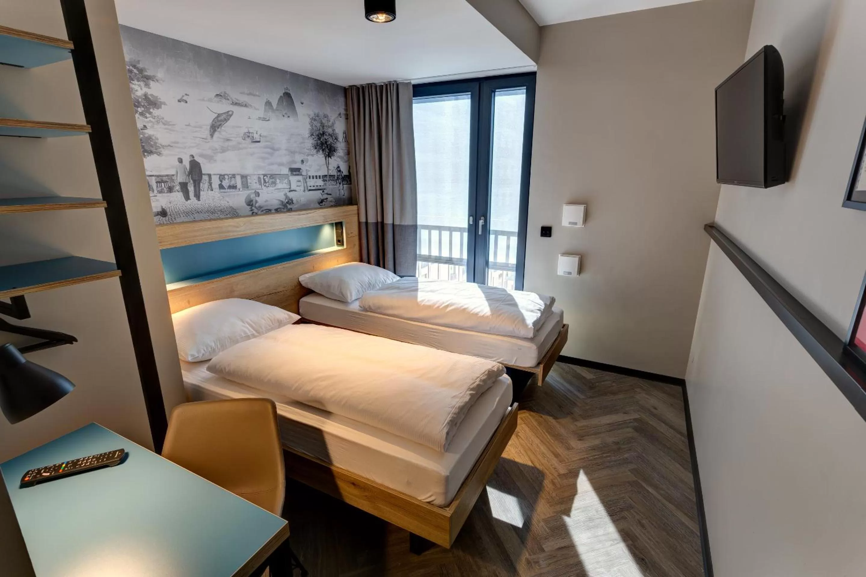 Bed in Schulz Hotel Berlin Wall at the East Side Gallery