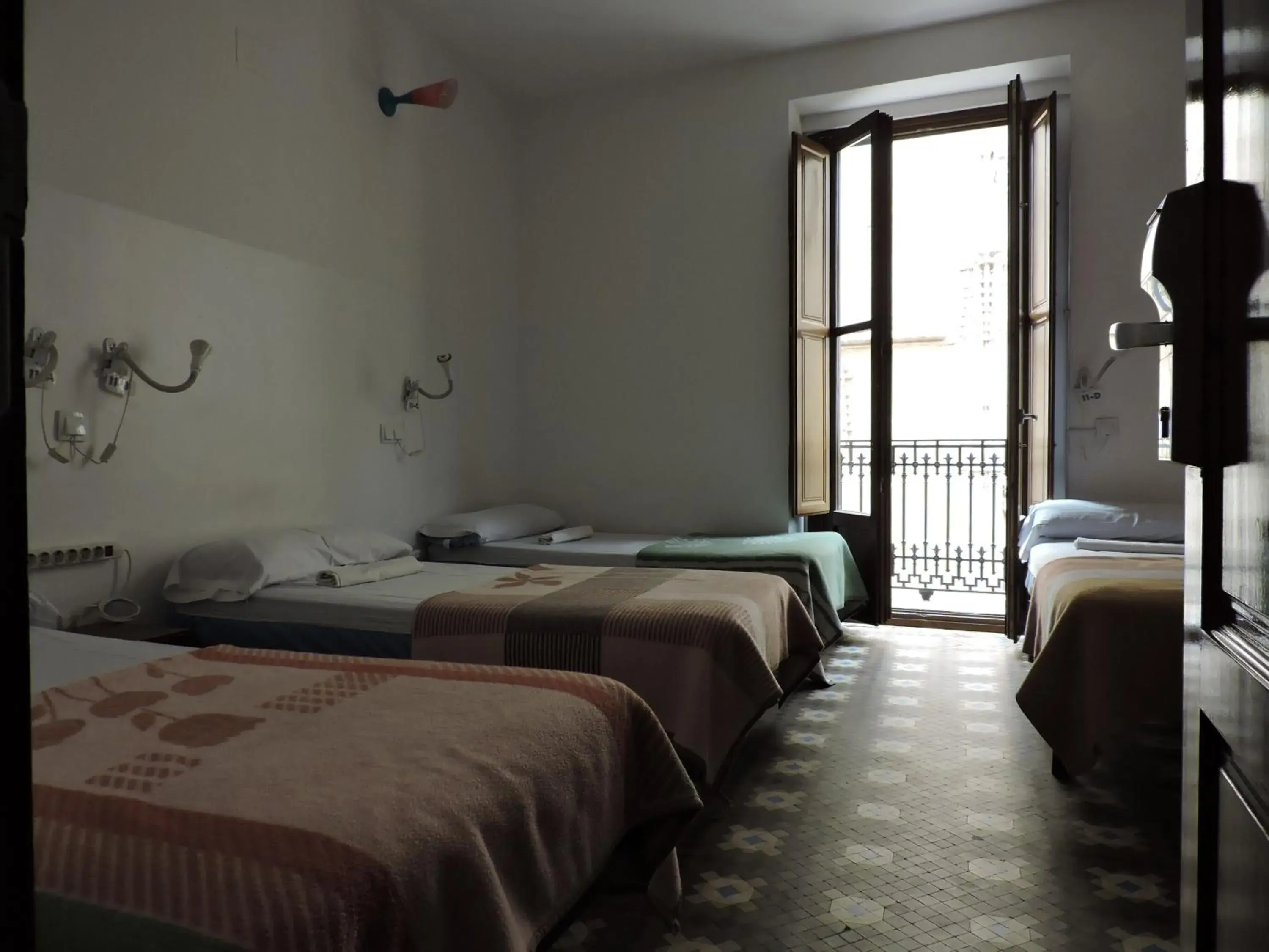Bed in Home Youth Hostel by Feetup Hostels