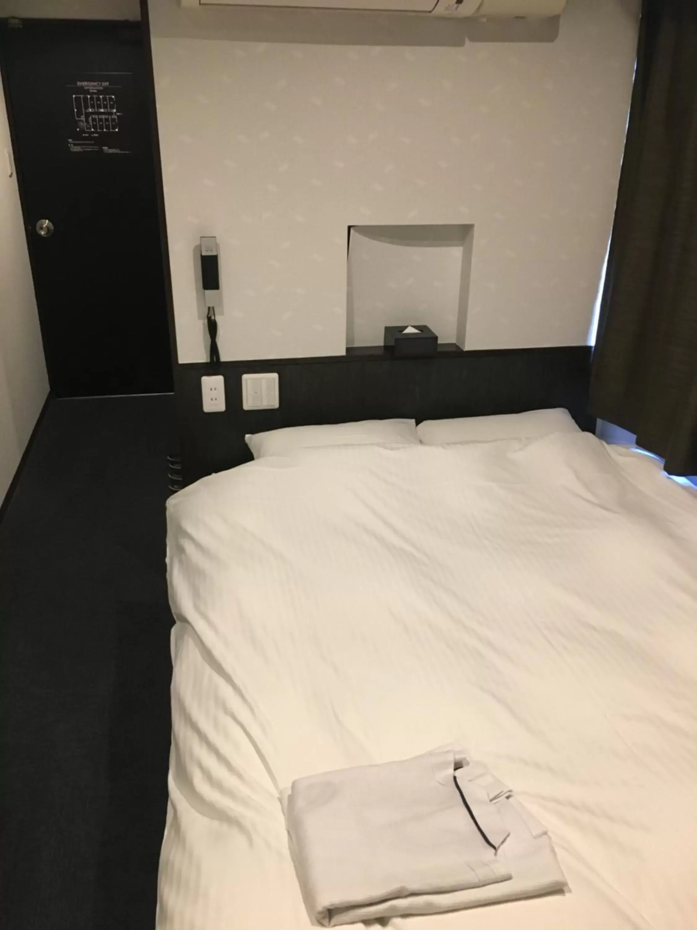 Bed in Nagoyaeki Access Hotel