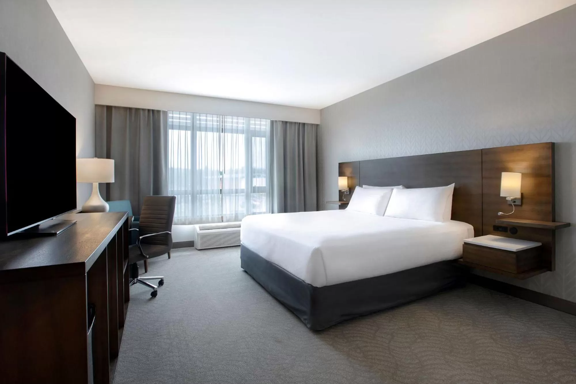 Bed in Great Blue Heron Hotel