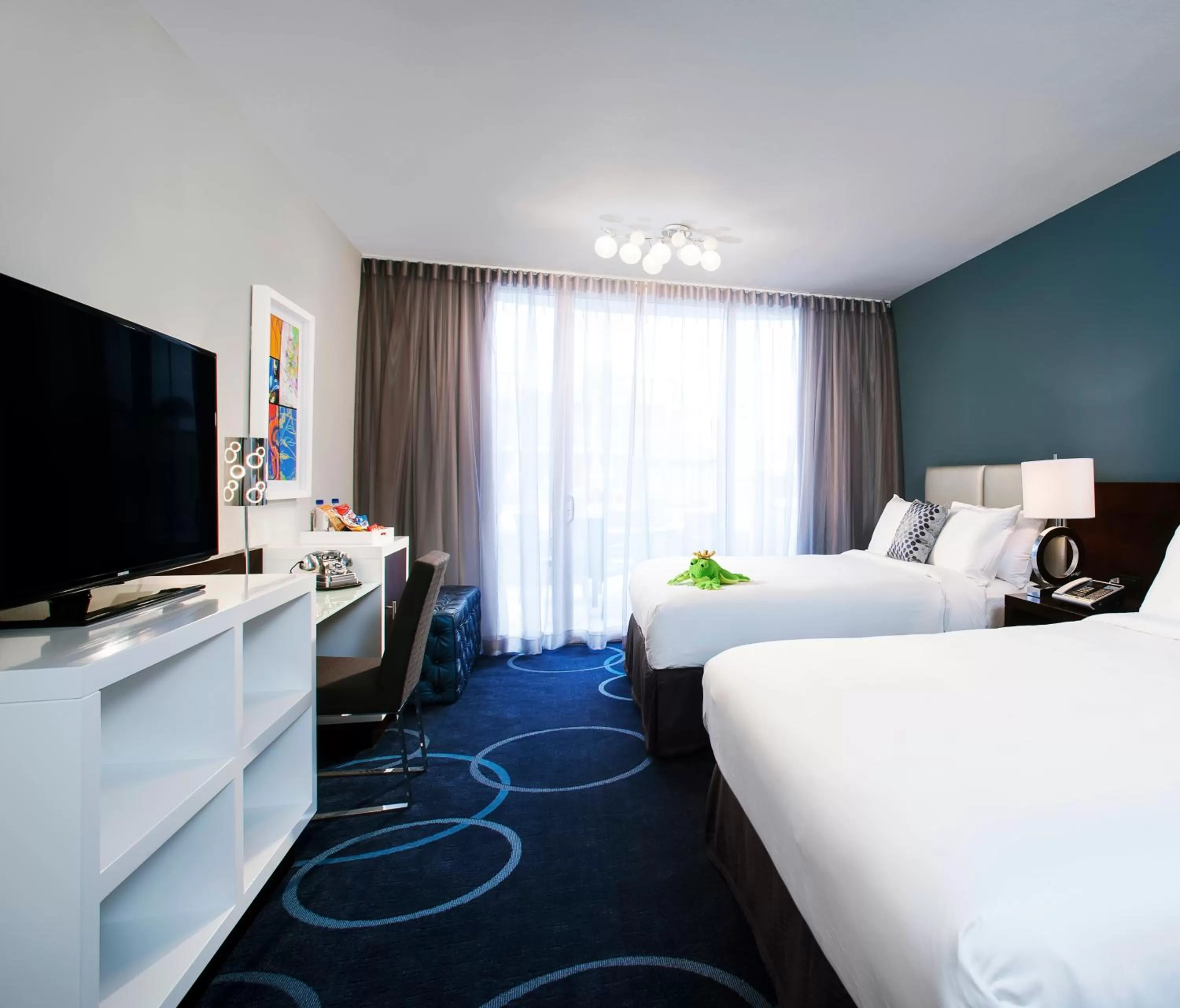 Bedroom, TV/Entertainment Center in B Resort and Spa Located in Disney Springs Resort Area