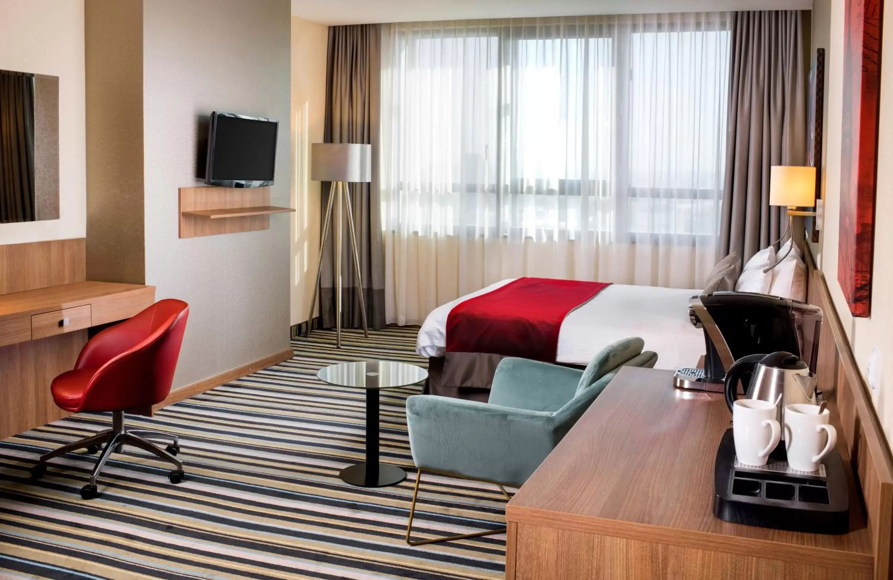 Bed, Seating Area in Leonardo Royal Hotel Warsaw