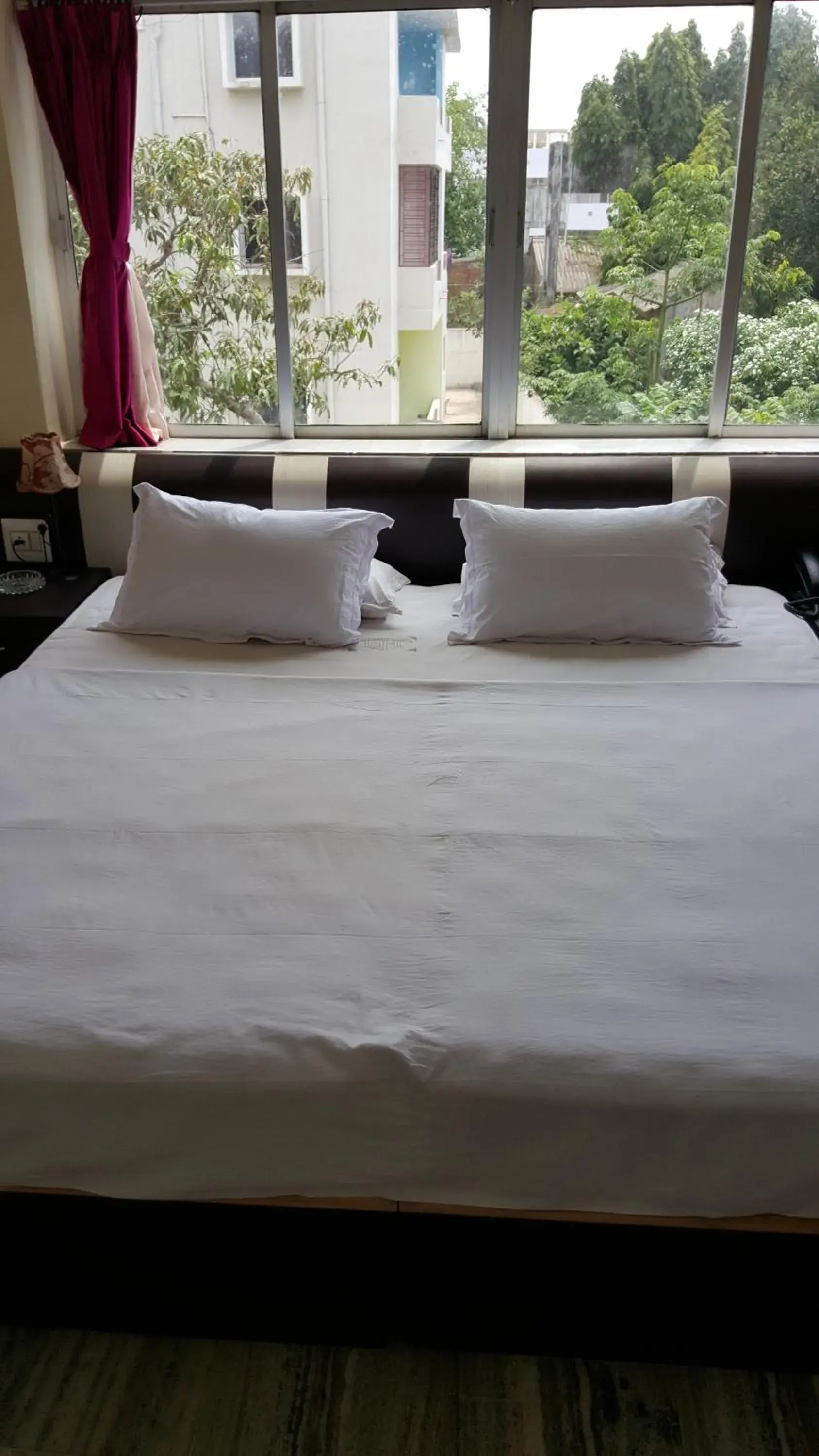 Bed in Gandhara Hotel