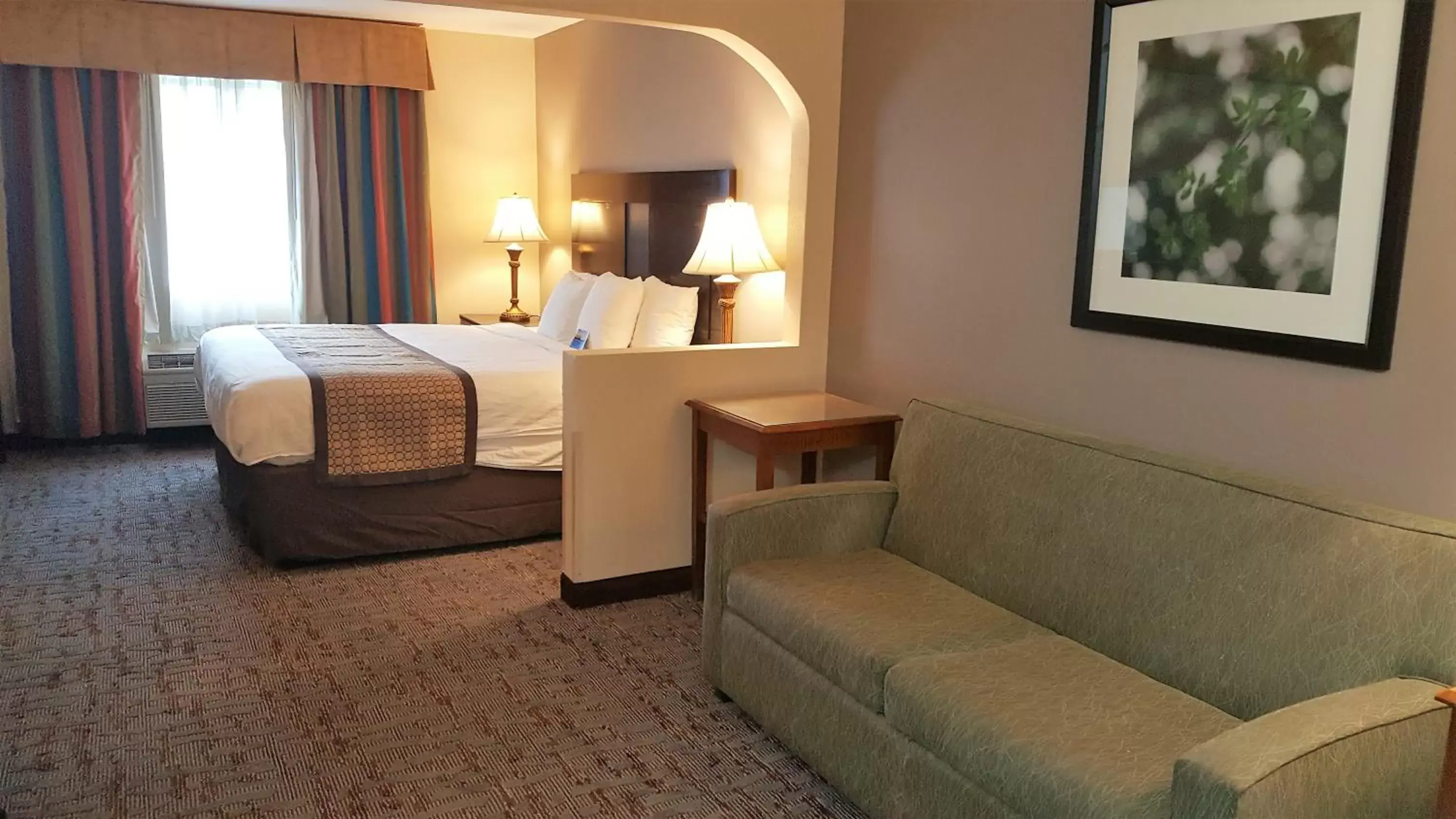 Bedroom in Baymont by Wyndham Belleville Airport Area Free Airport Shuttle