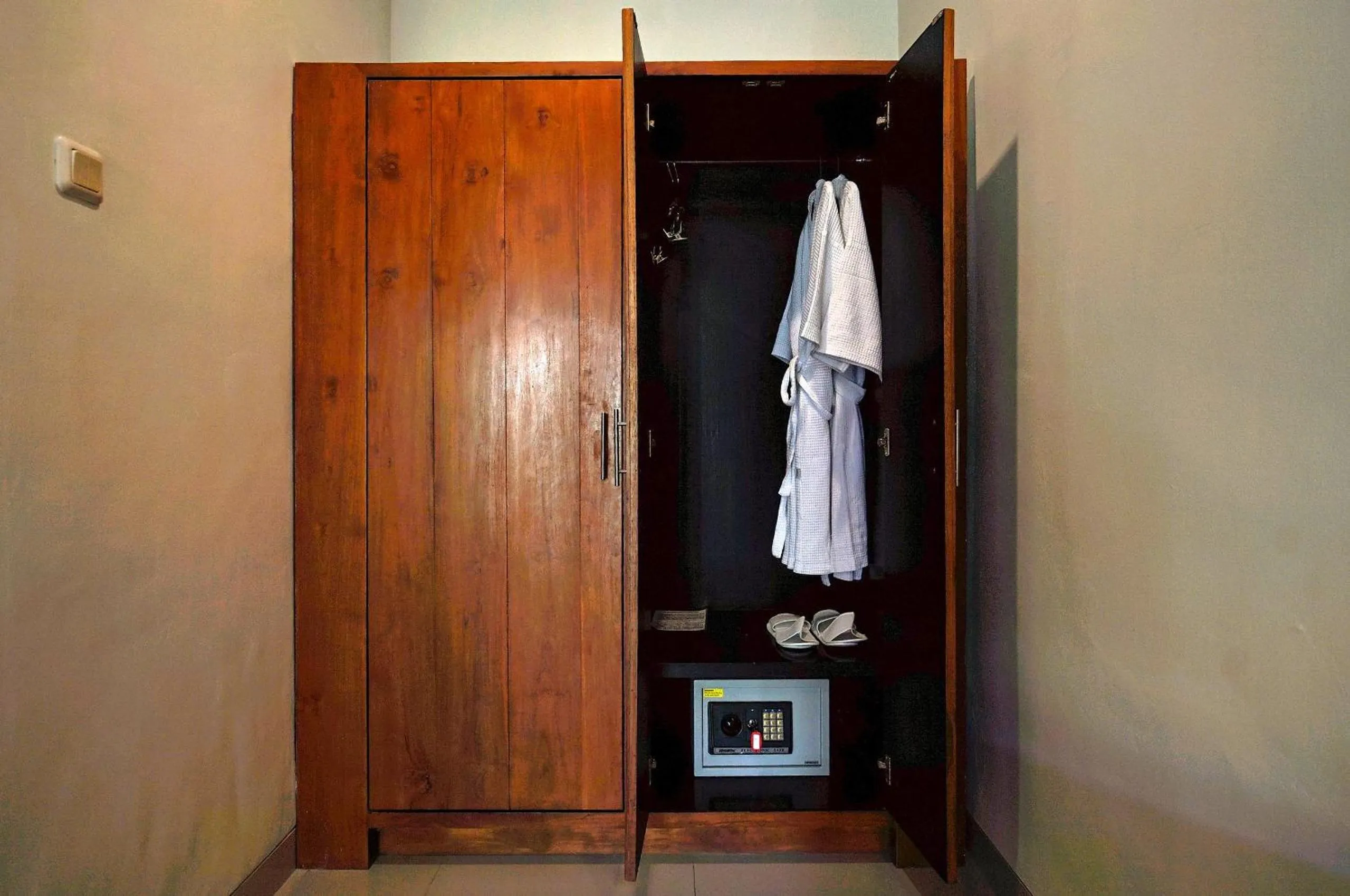 wardrobe in Pertiwi Resort & Spa