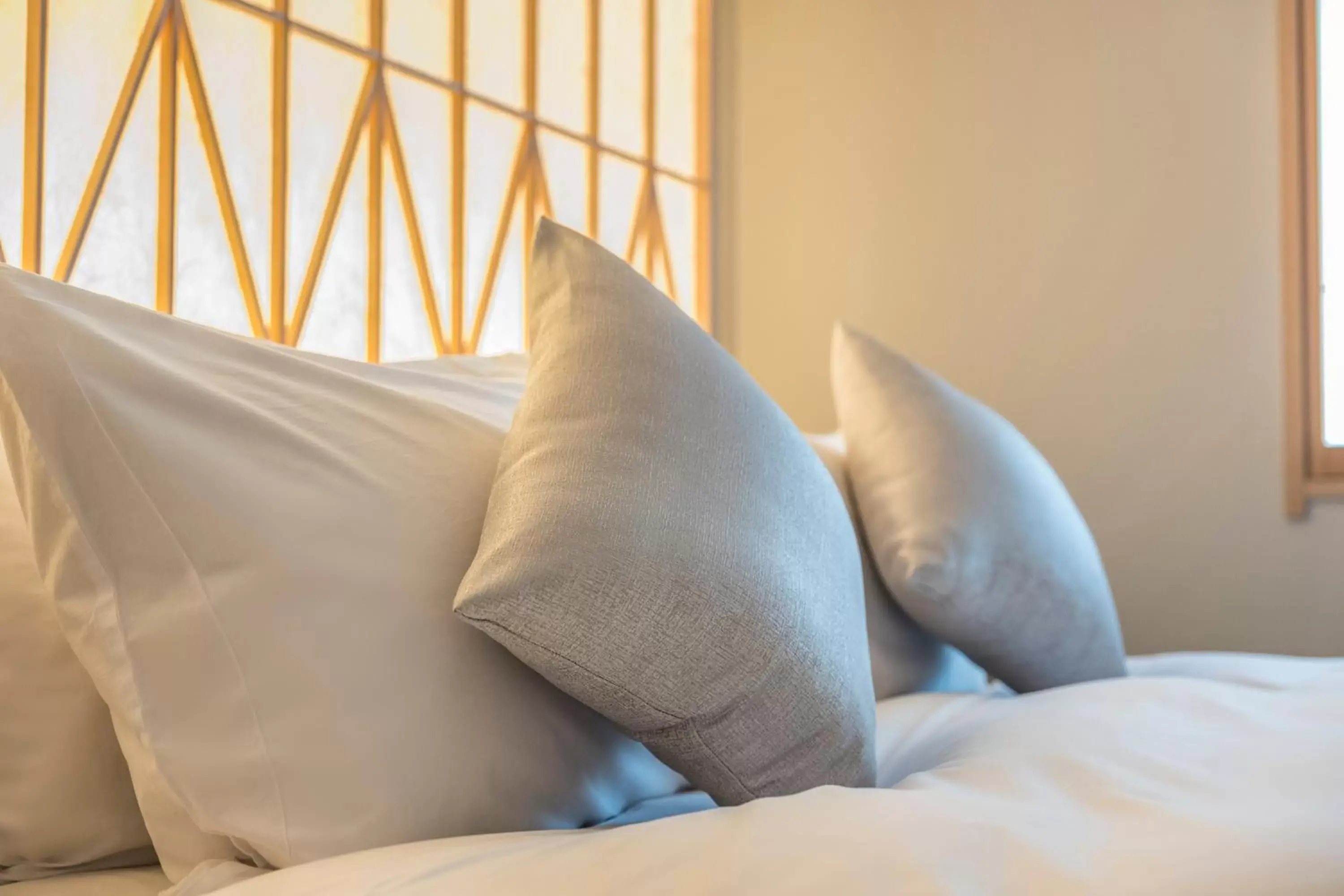 Bed in Tomoya Residence Hotel Kyoto