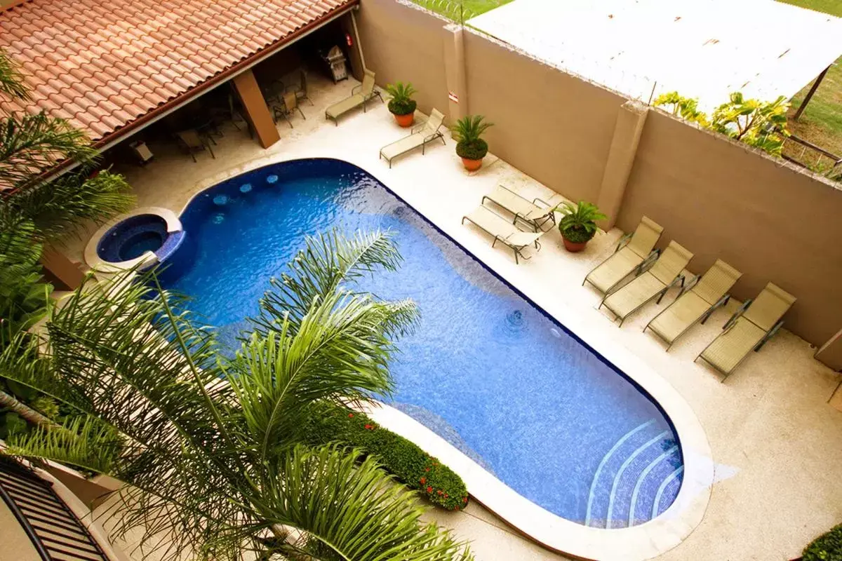 Day, Pool View in Monaco Condominiums