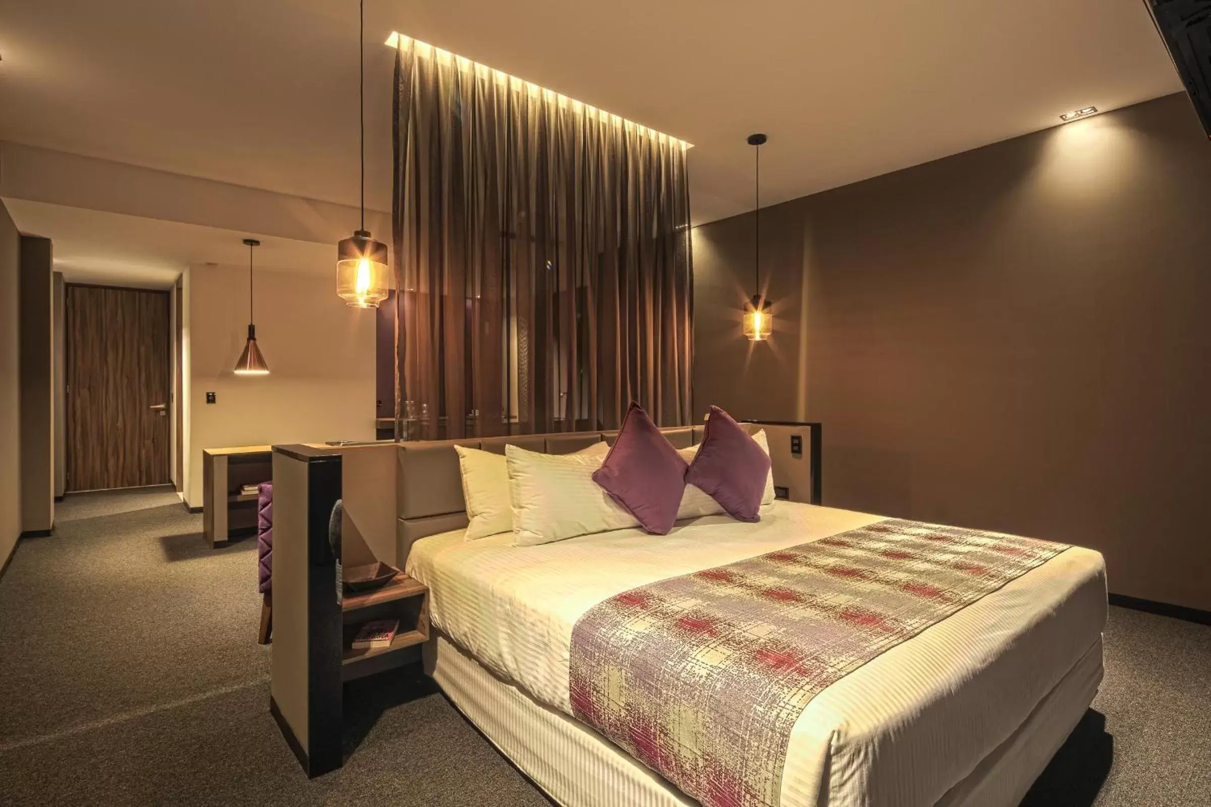 Photo of the whole room, Bed in Kharma Suites