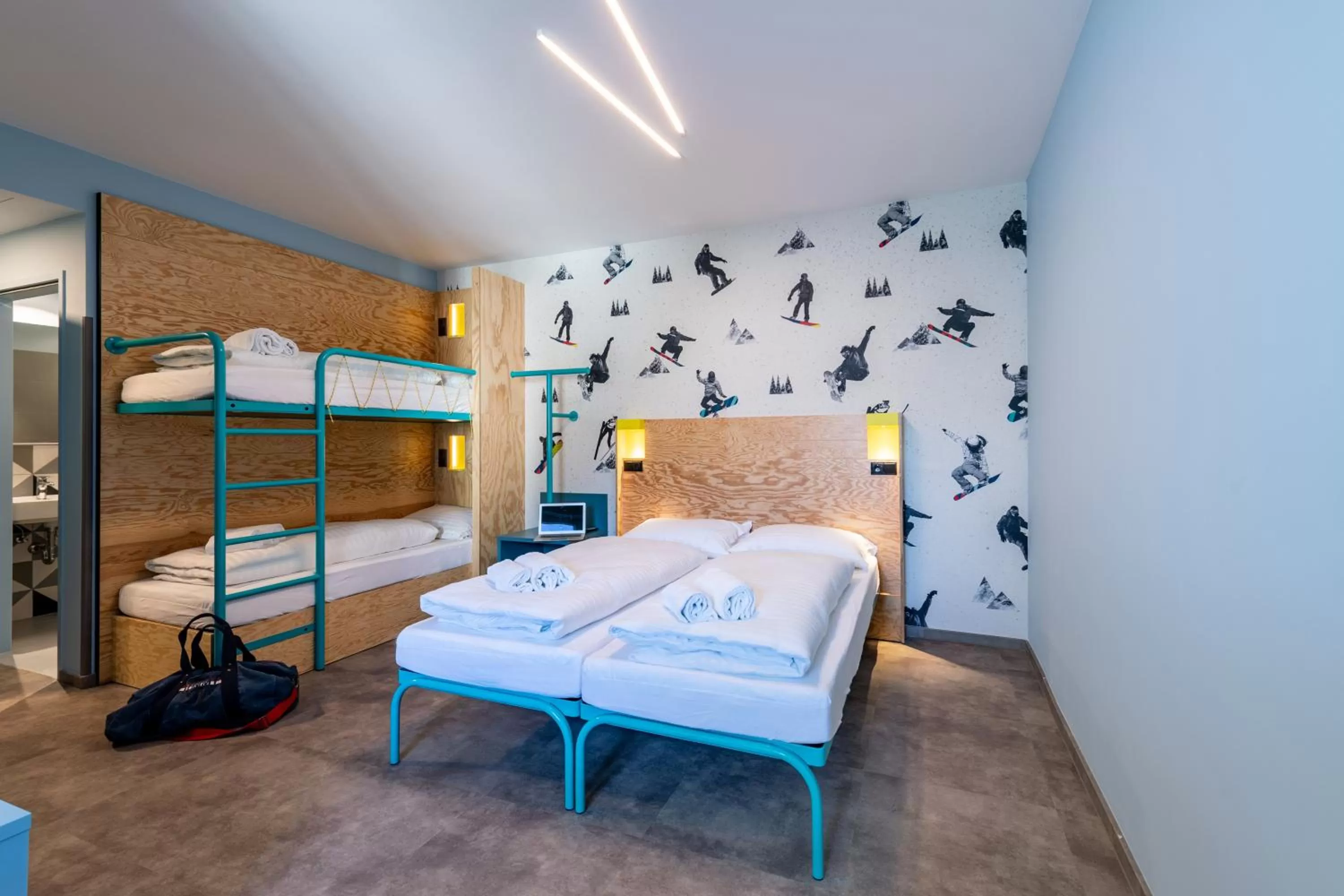 Photo of the whole room, Bed in MEININGER Hotel Innsbruck Zentrum