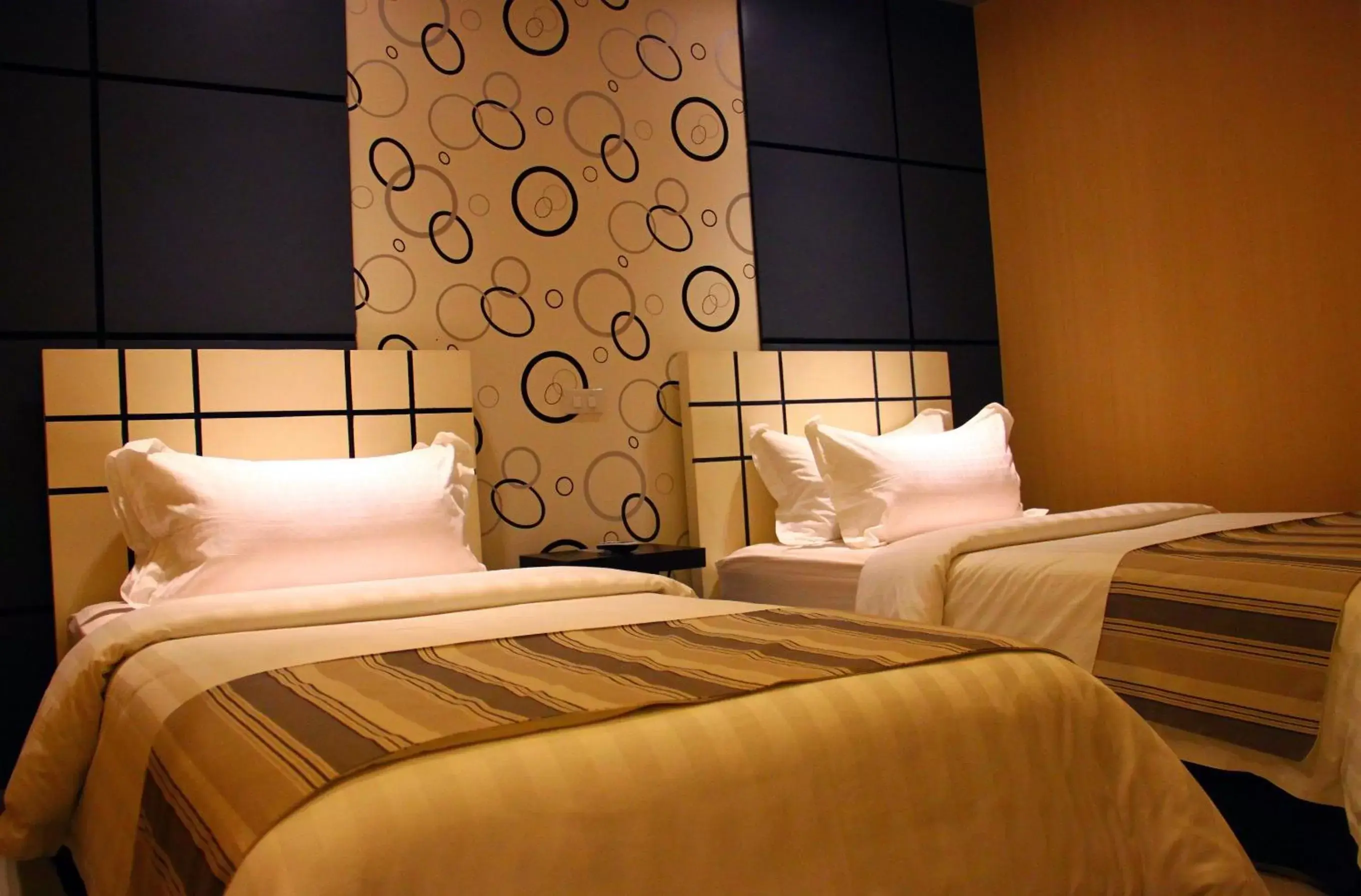 Bed in Eloisa Royal Suites