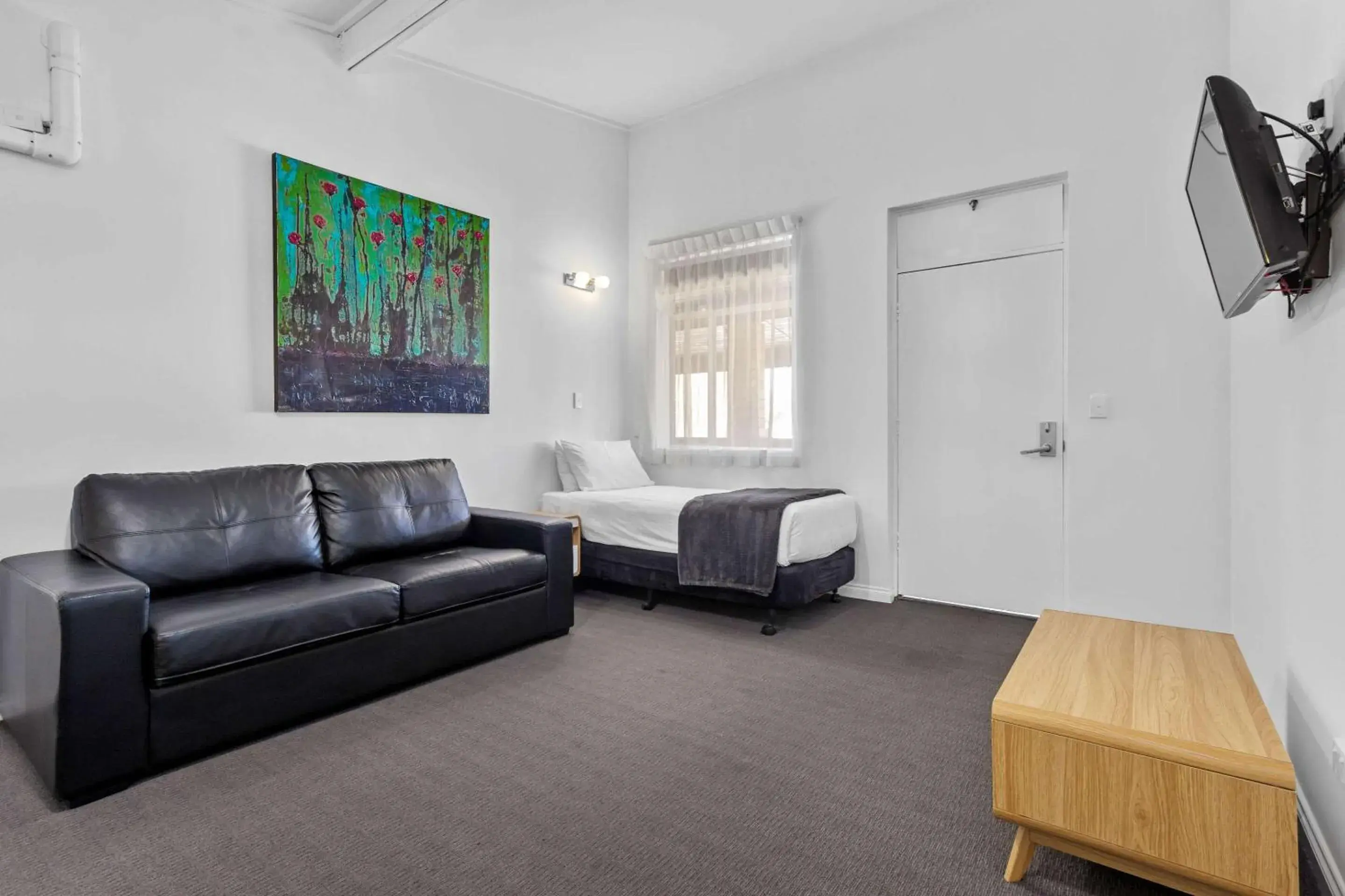 Bedroom, Seating Area in Econo Lodge East Adelaide