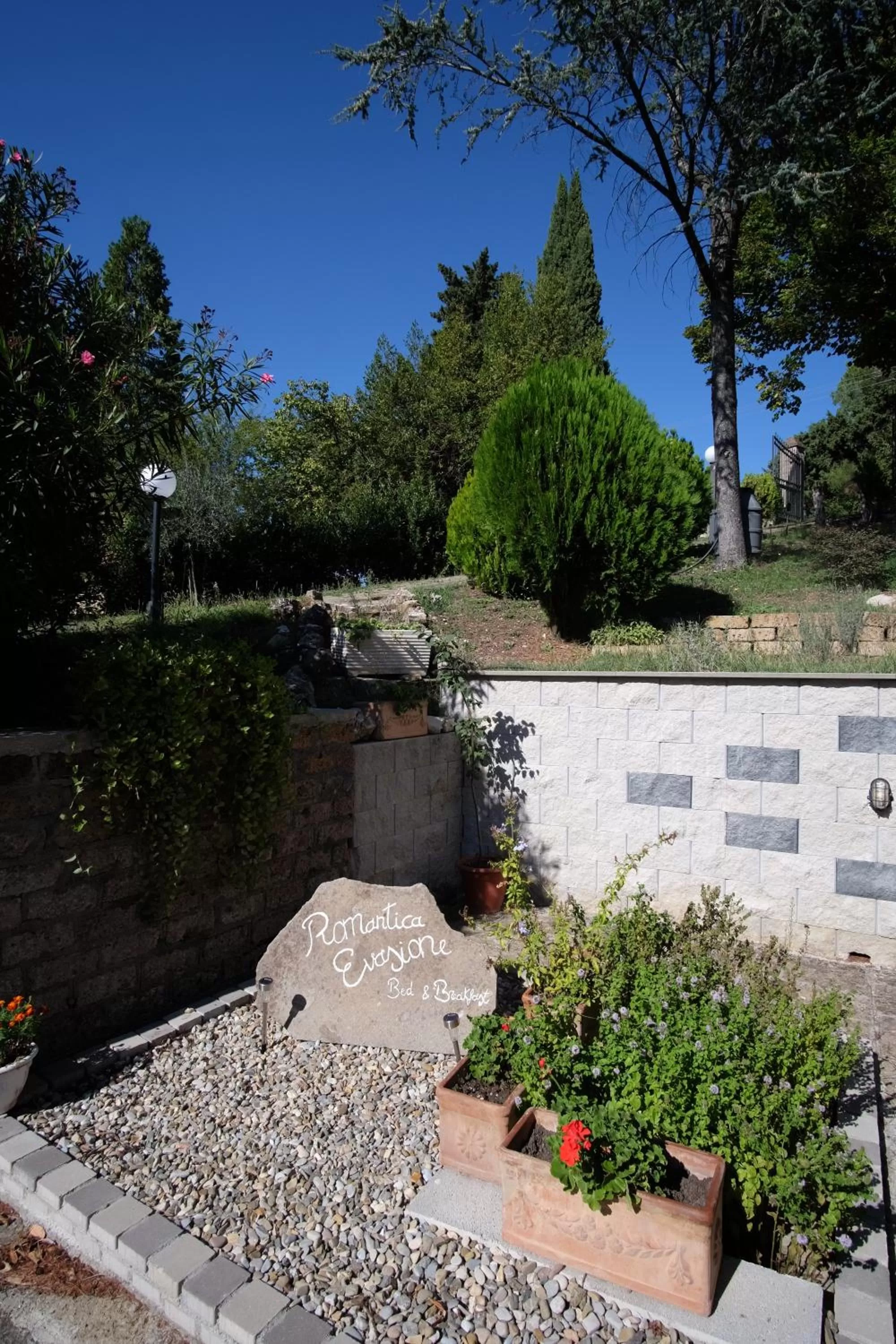 Property logo or sign, Patio/Outdoor Area in Bed and Breakfast Romantica Evasione