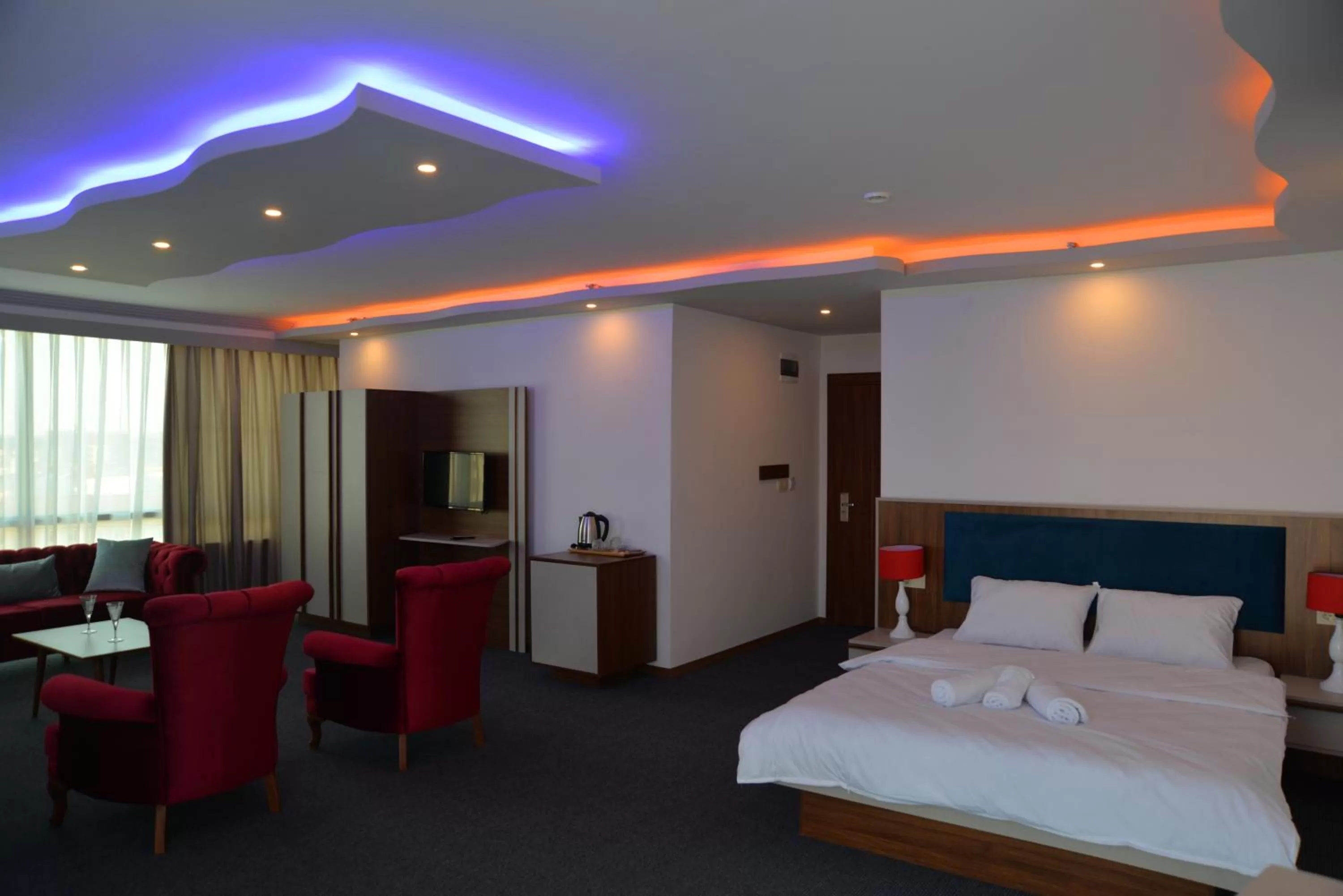 Bed in TEVETOGLU HOTEL