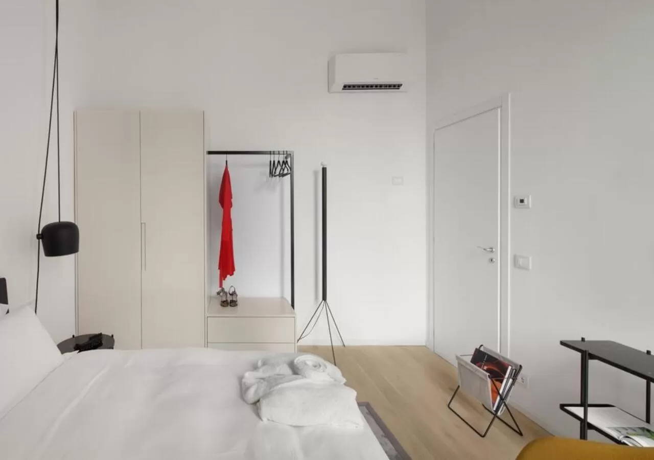 Bed in BB Hotels Aparthotel Collection Il Michelangelo