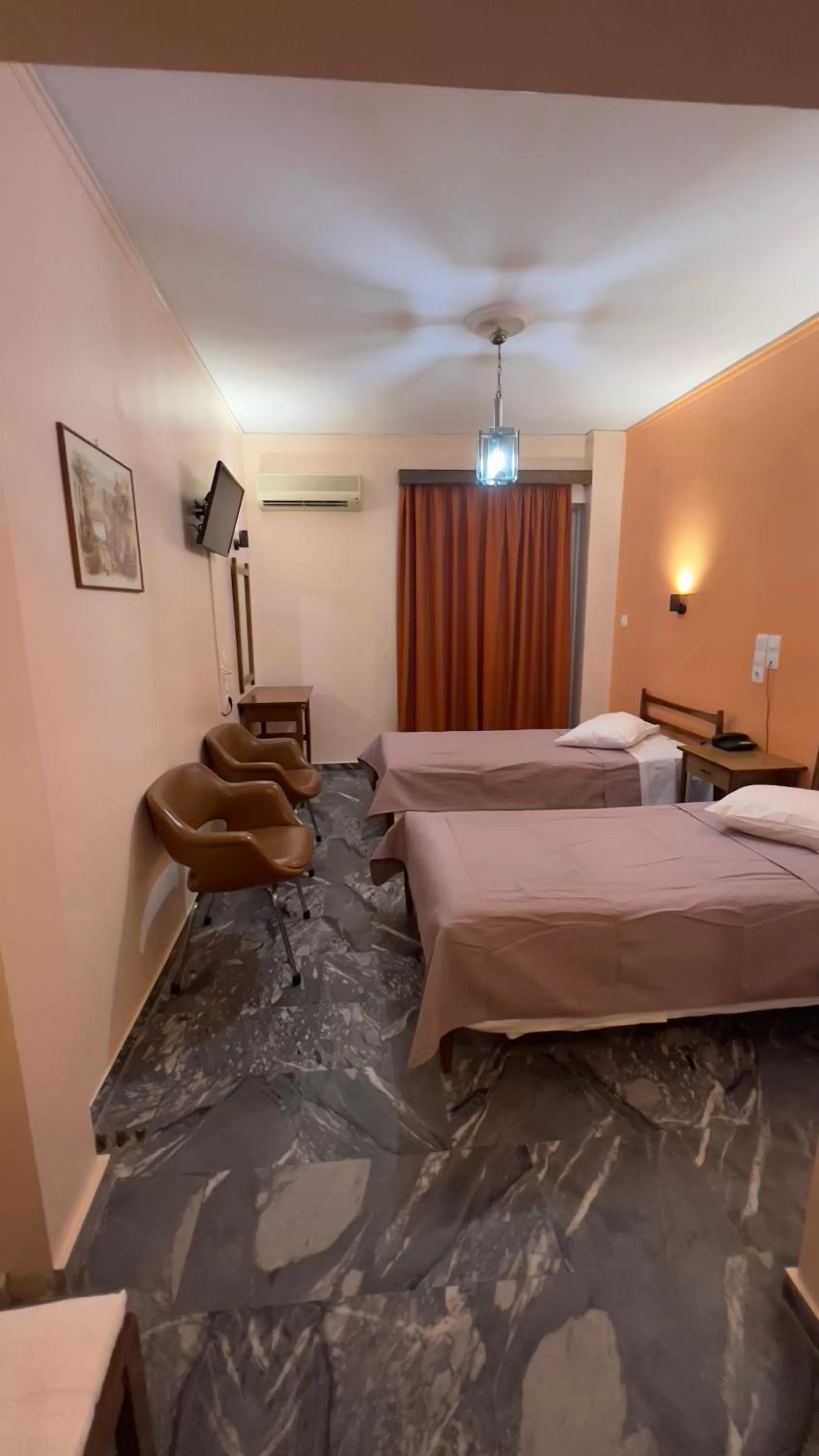 Photo of the whole room in Hotel Cosmos