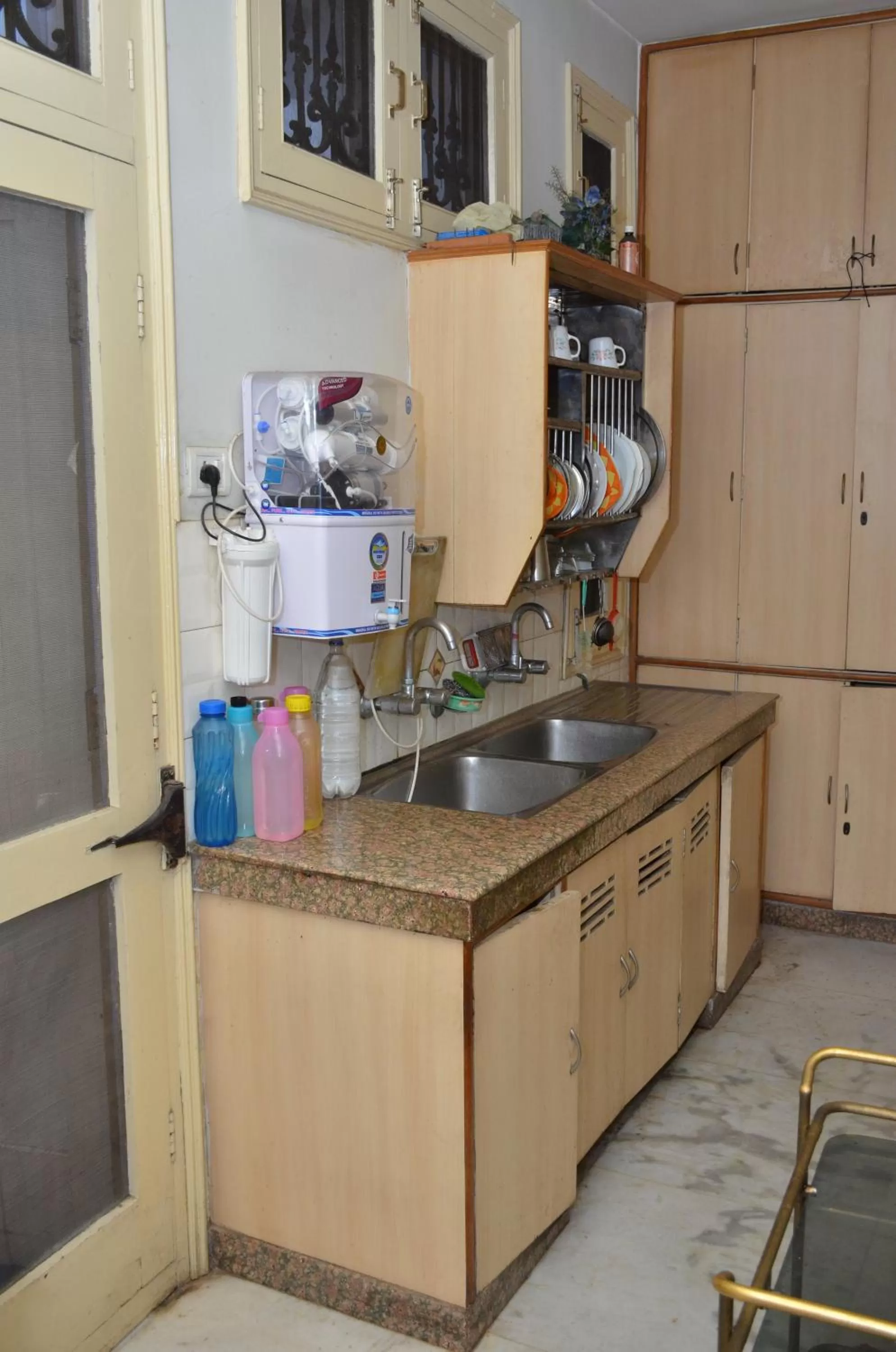 Kitchen or kitchenette in Sandy's Homestay