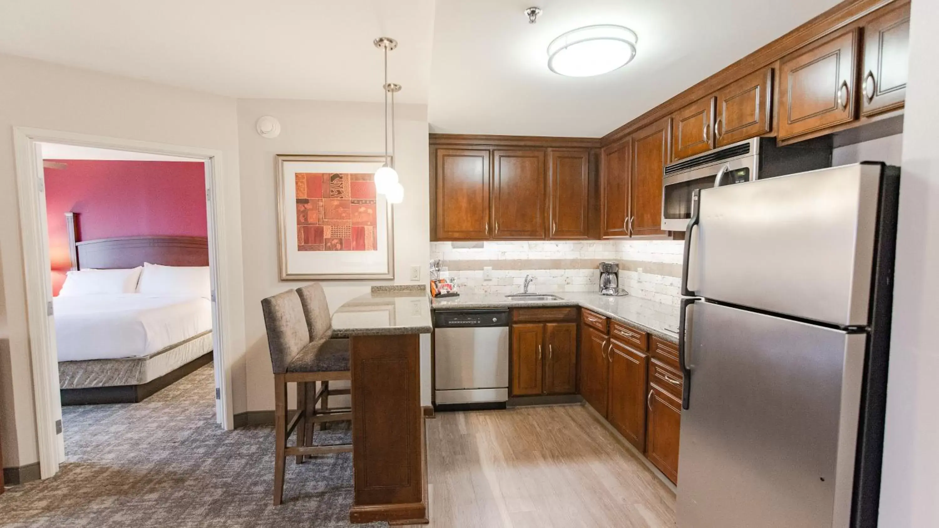 Photo of the whole room, Kitchen/Kitchenette in Staybridge Suites Wilmington East, an IHG Hotel