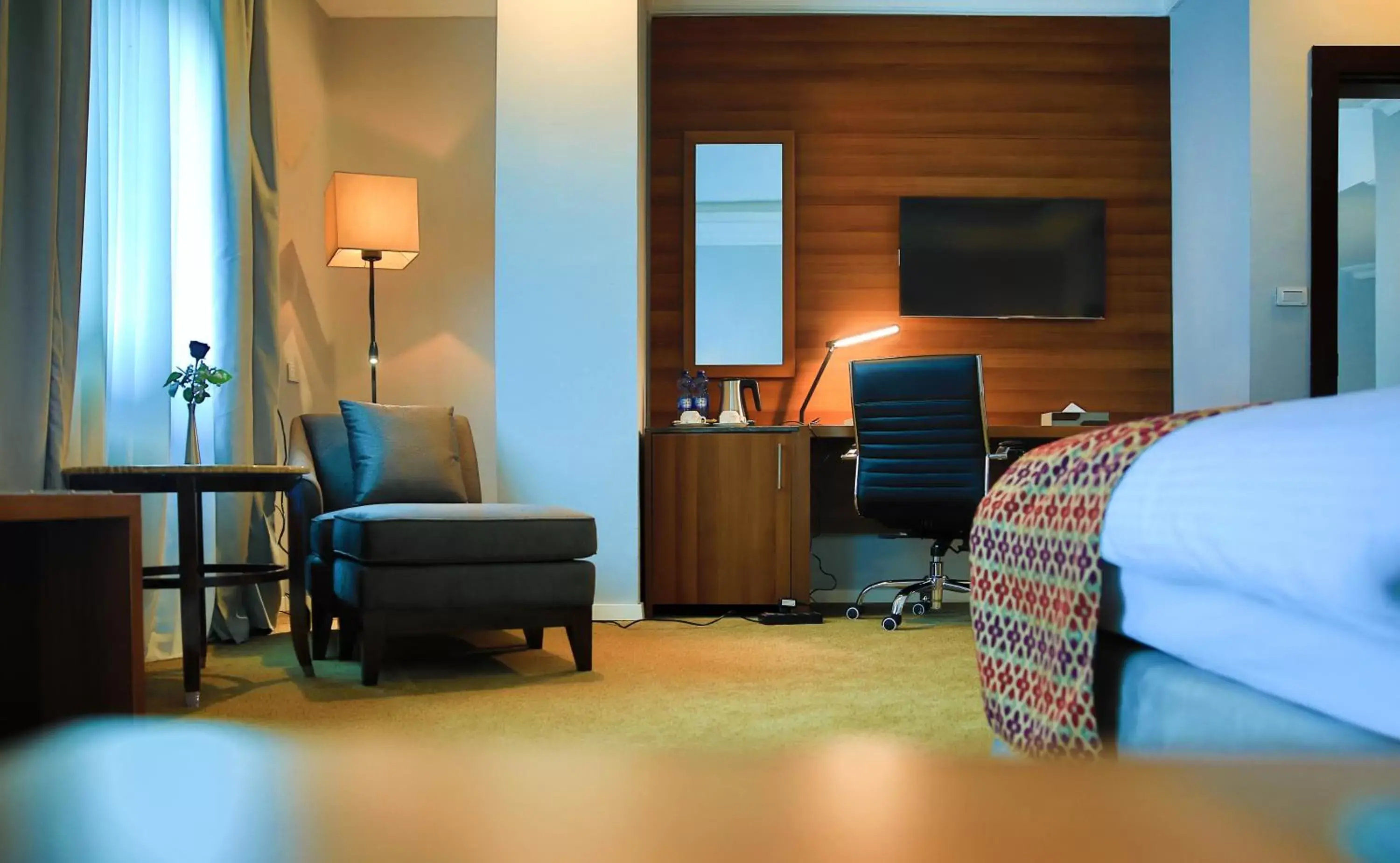 Communal lounge/ TV room, Bed in Swiss Inn Nexus Hotel Communal lounge/ TV room, Bed in Swiss Inn Nexus Hotel