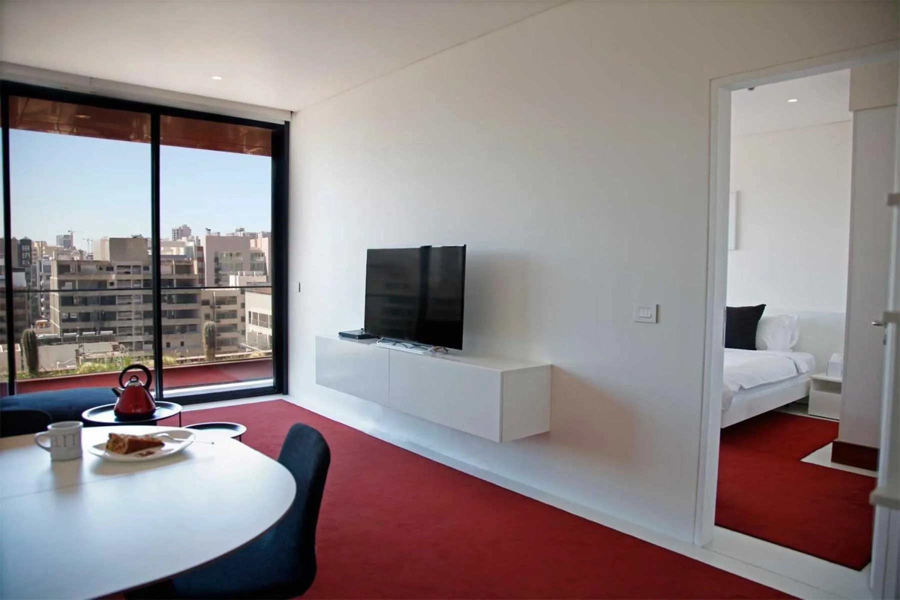 Living room, Bed in 1866 Court & Suites Hotel