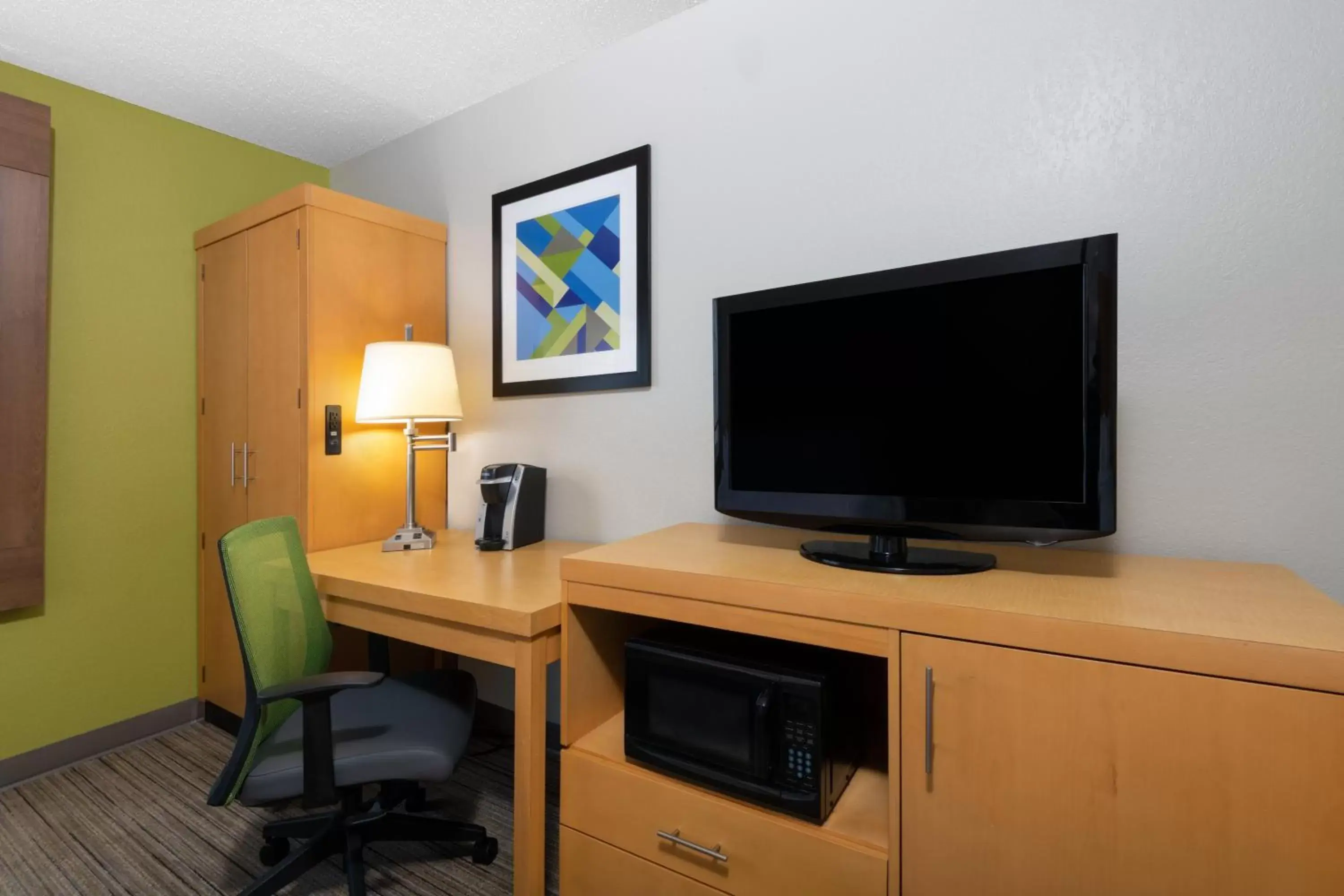 Photo of the whole room, TV/Entertainment Center in Holiday Inn Express & Suites Wheat Ridge-Denver West, an IHG Hotel