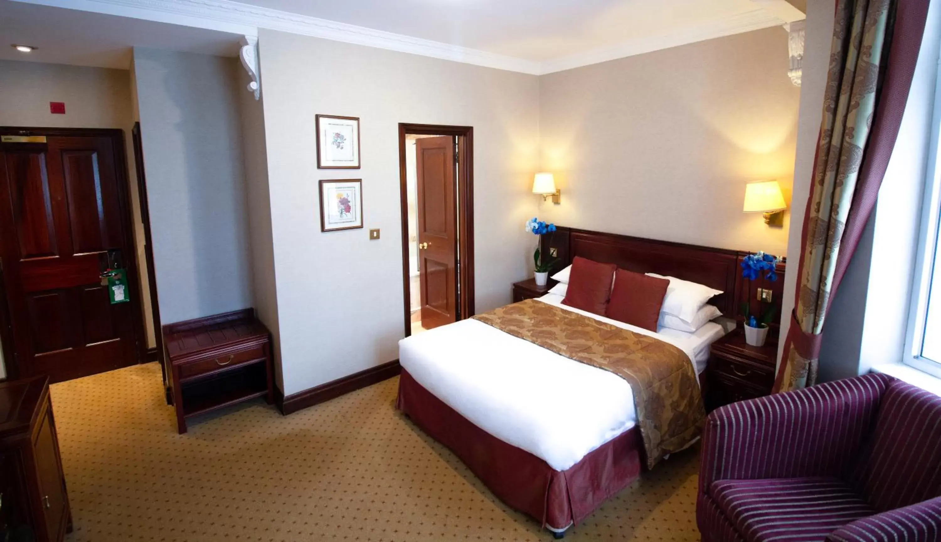 Bed in Rochester Hotel by Blue Orchid