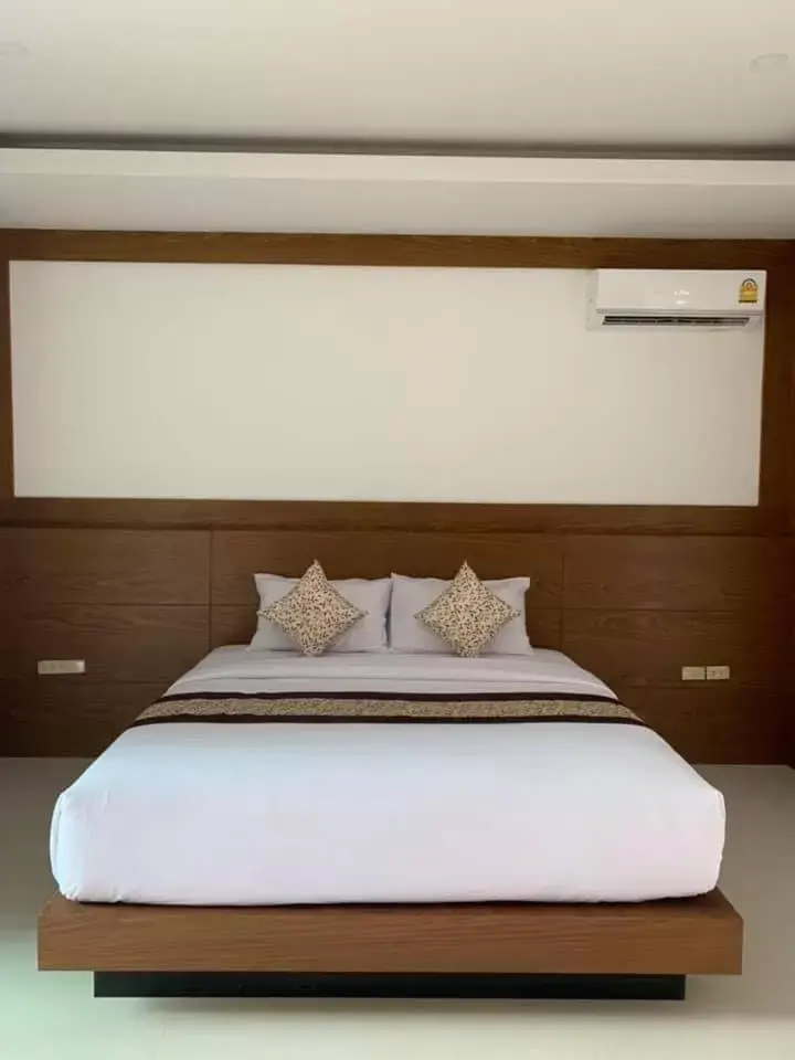 Bed in Vipa Tropical Resort