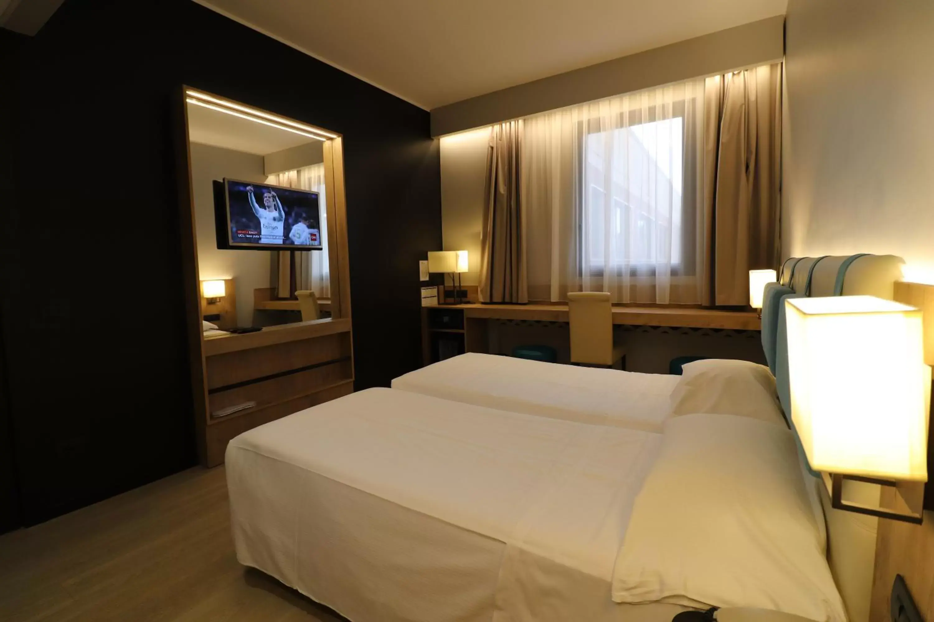 Bed in Hotel Domenichino
