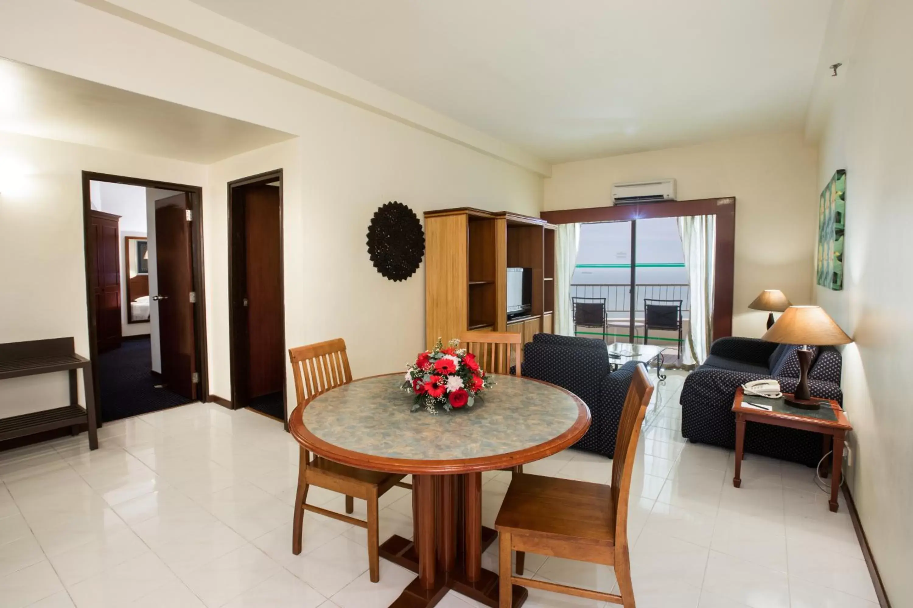 Living room in Rainbow Paradise Beach Resort