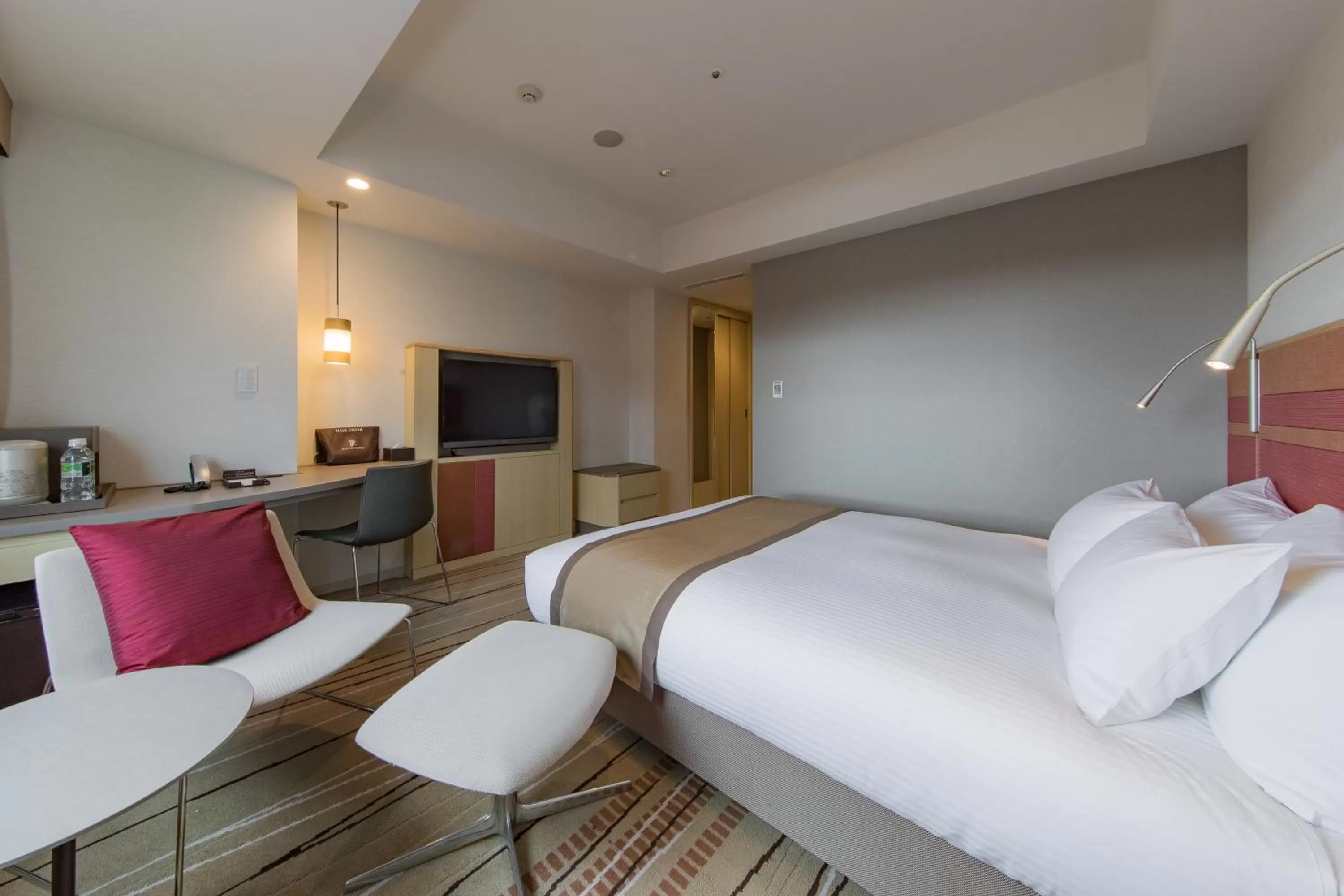 Photo of the whole room, Bed in JR Kyushu Hotel Blossom Hakata Central