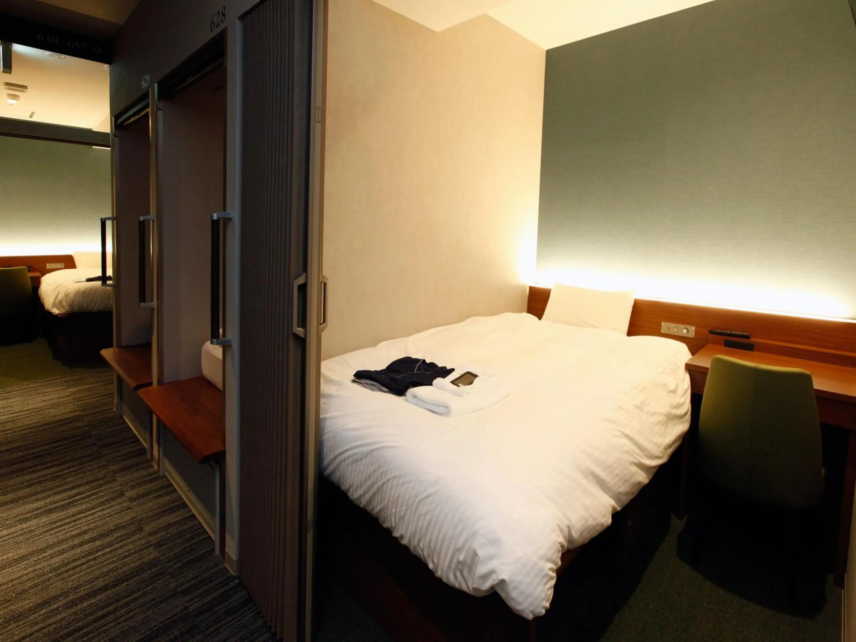 Bed in Gardens Cabin