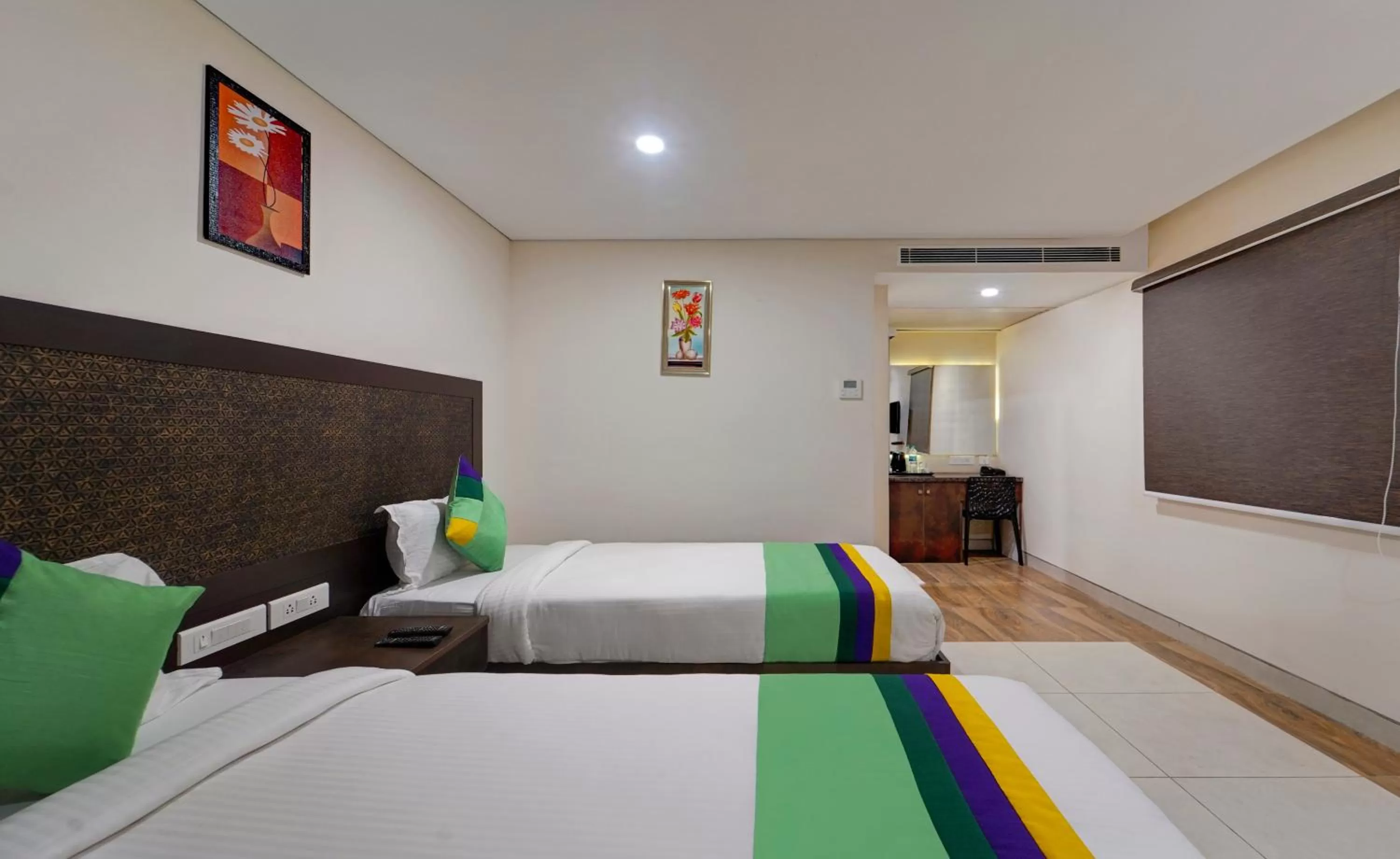 Bed in Treebo Vetri Supreme Residency