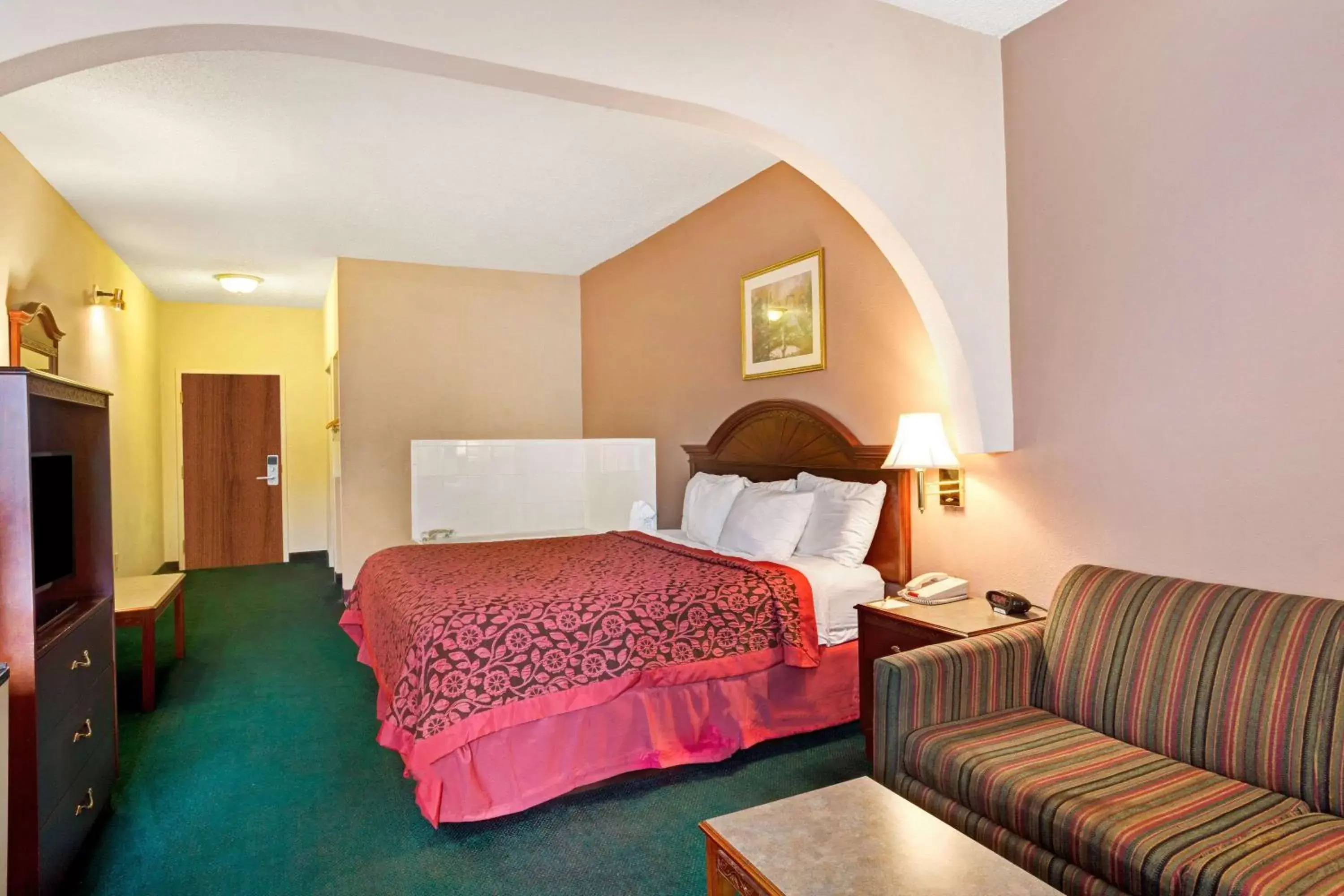 Photo of the whole room, Bed in Days Inn & Suites by Wyndham Louisville SW