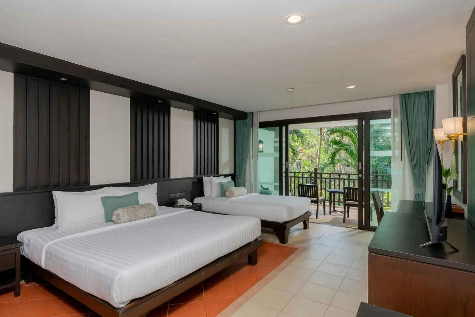 Bedroom in Ravindra Beach Resort & Spa - SHA Extra Plus