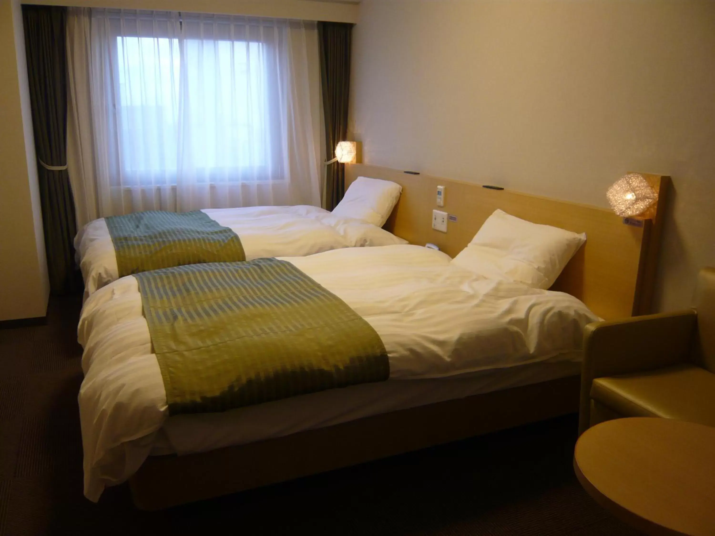 Living room, Bed in Dormy Inn Obihiro