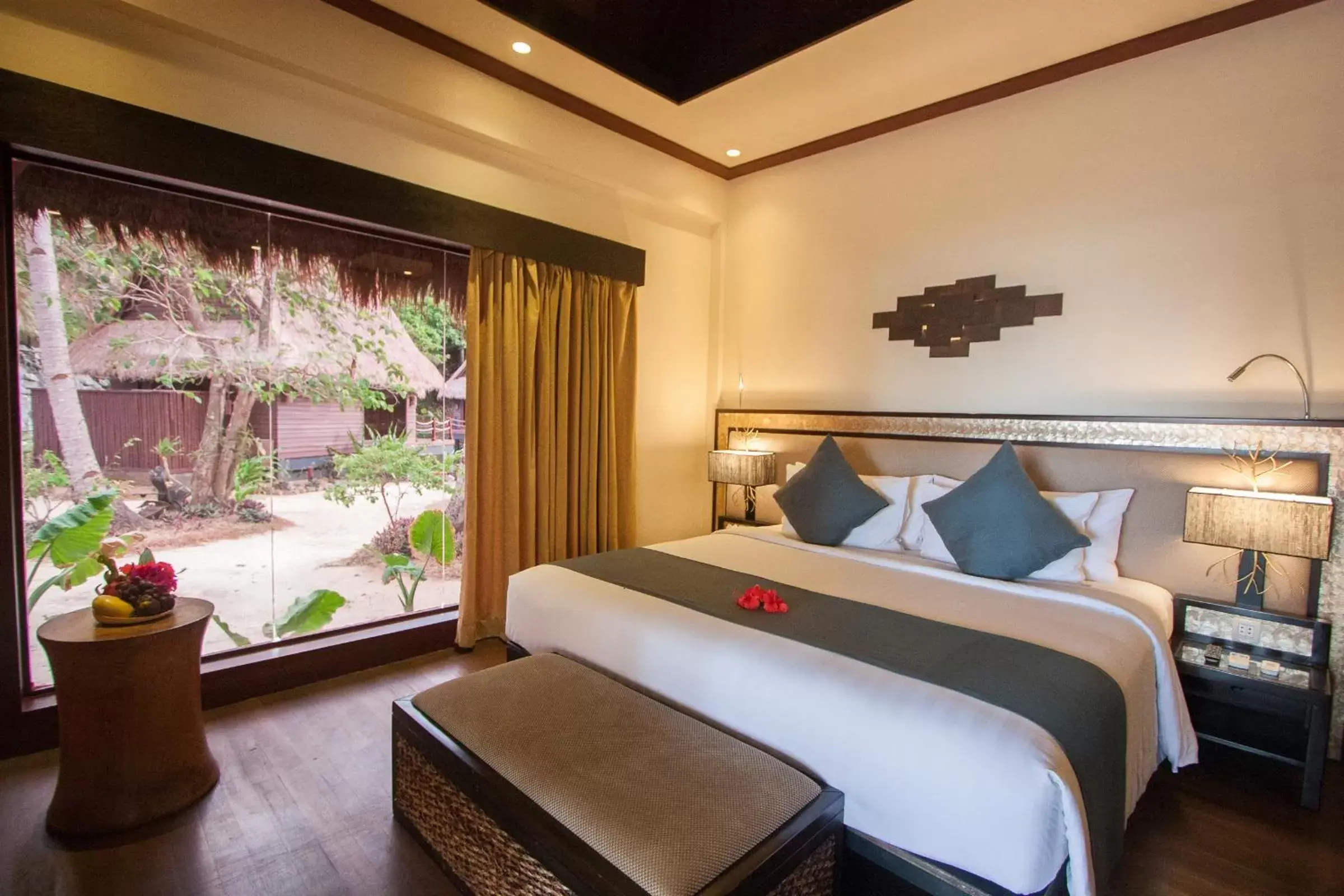 Bed in Cauayan Island Resort and Spa Bed in Cauayan Island Resort and Spa