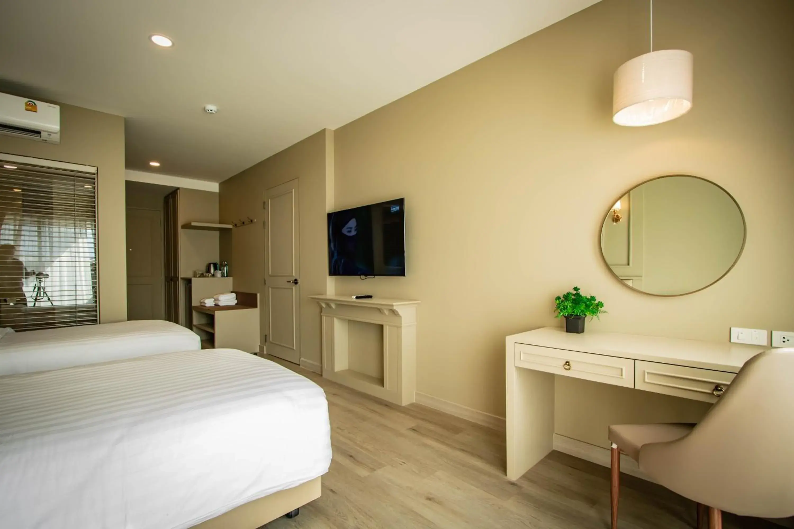 Bed, TV/Entertainment Center in Eurana Boutique Hotel