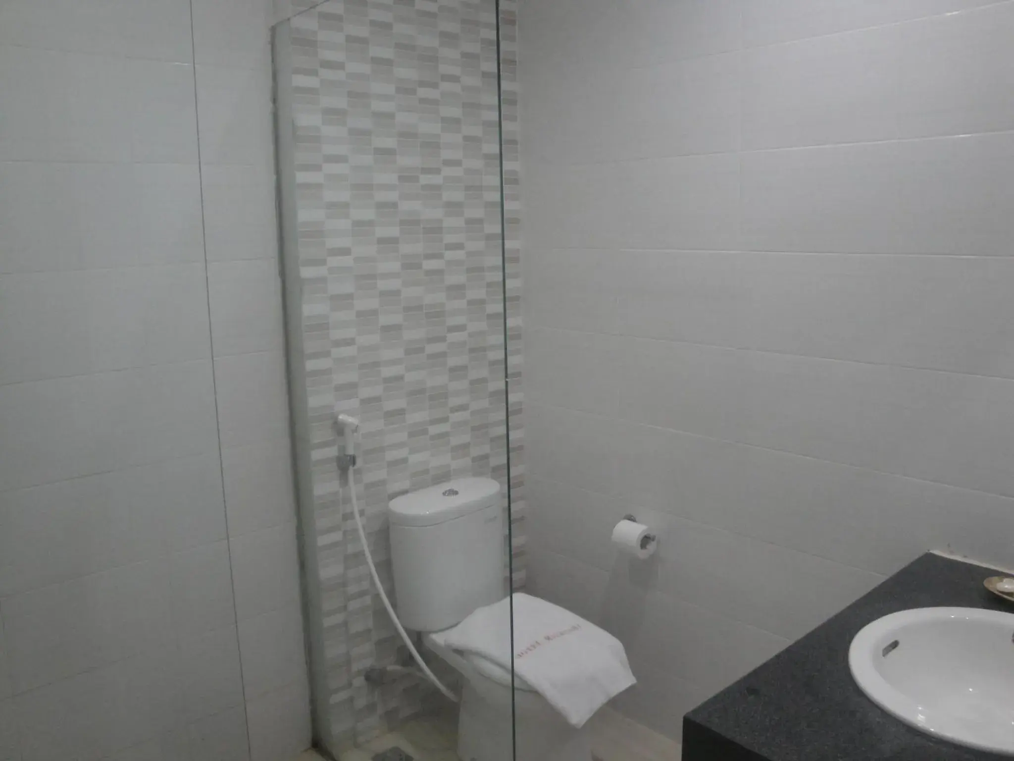 Bathroom in Matahari Hotel