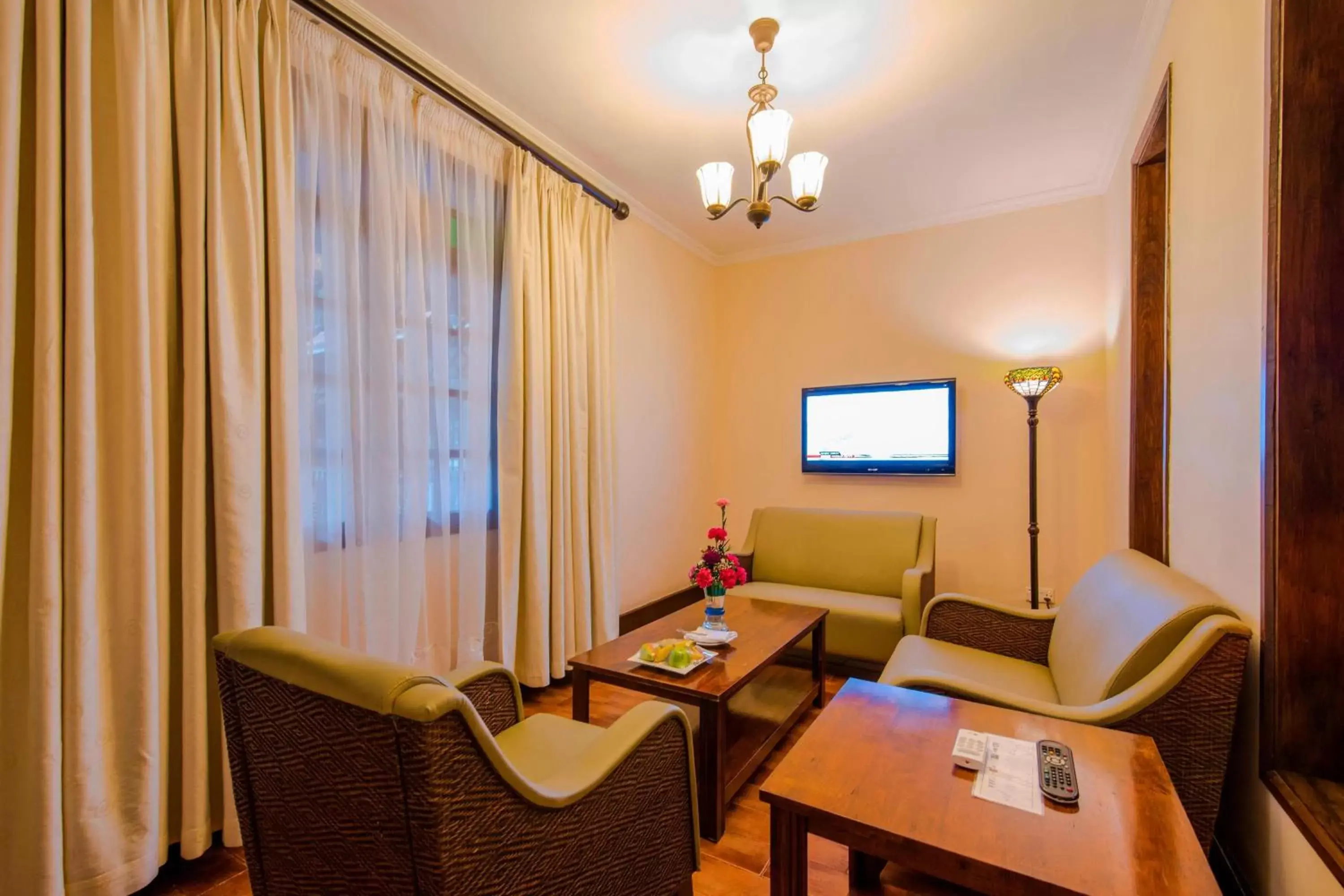 Photo of the whole room, Seating Area in Protea Hotel by Marriott Dar es Salaam Courtyard