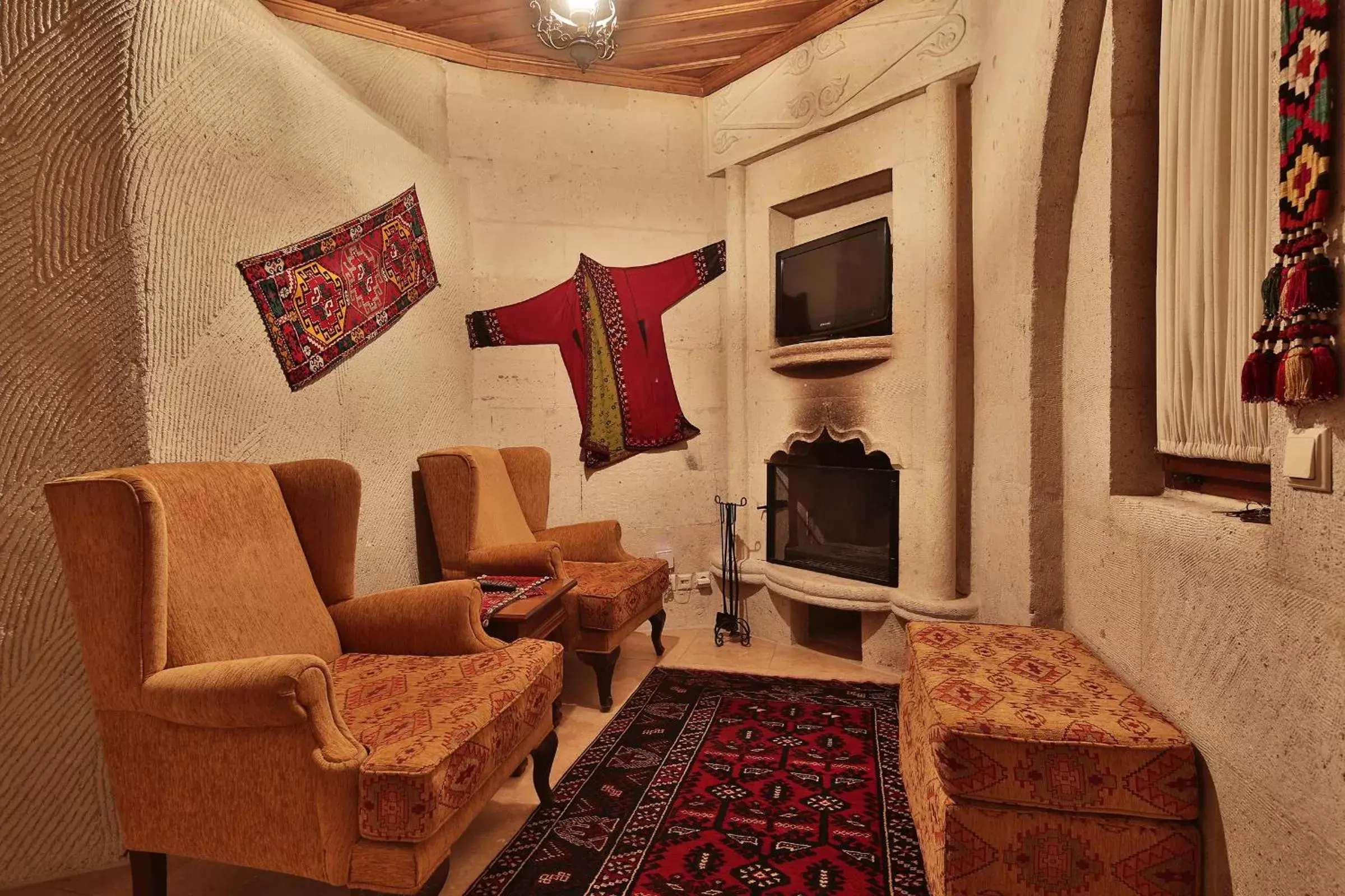 TV and multimedia, Seating Area in Cappadocia Cave Suites