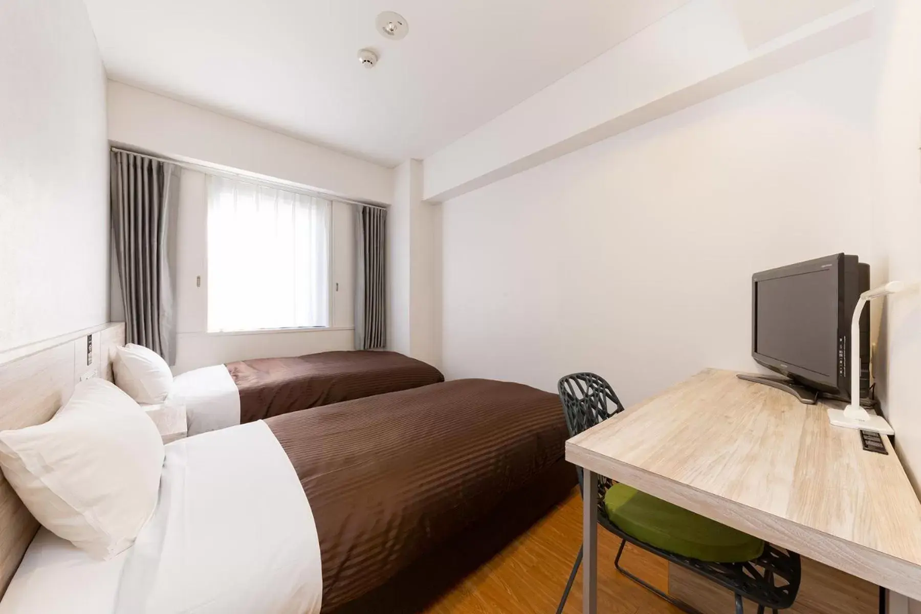 Photo of the whole room, Bed in The OneFive Fukuoka Tenjin