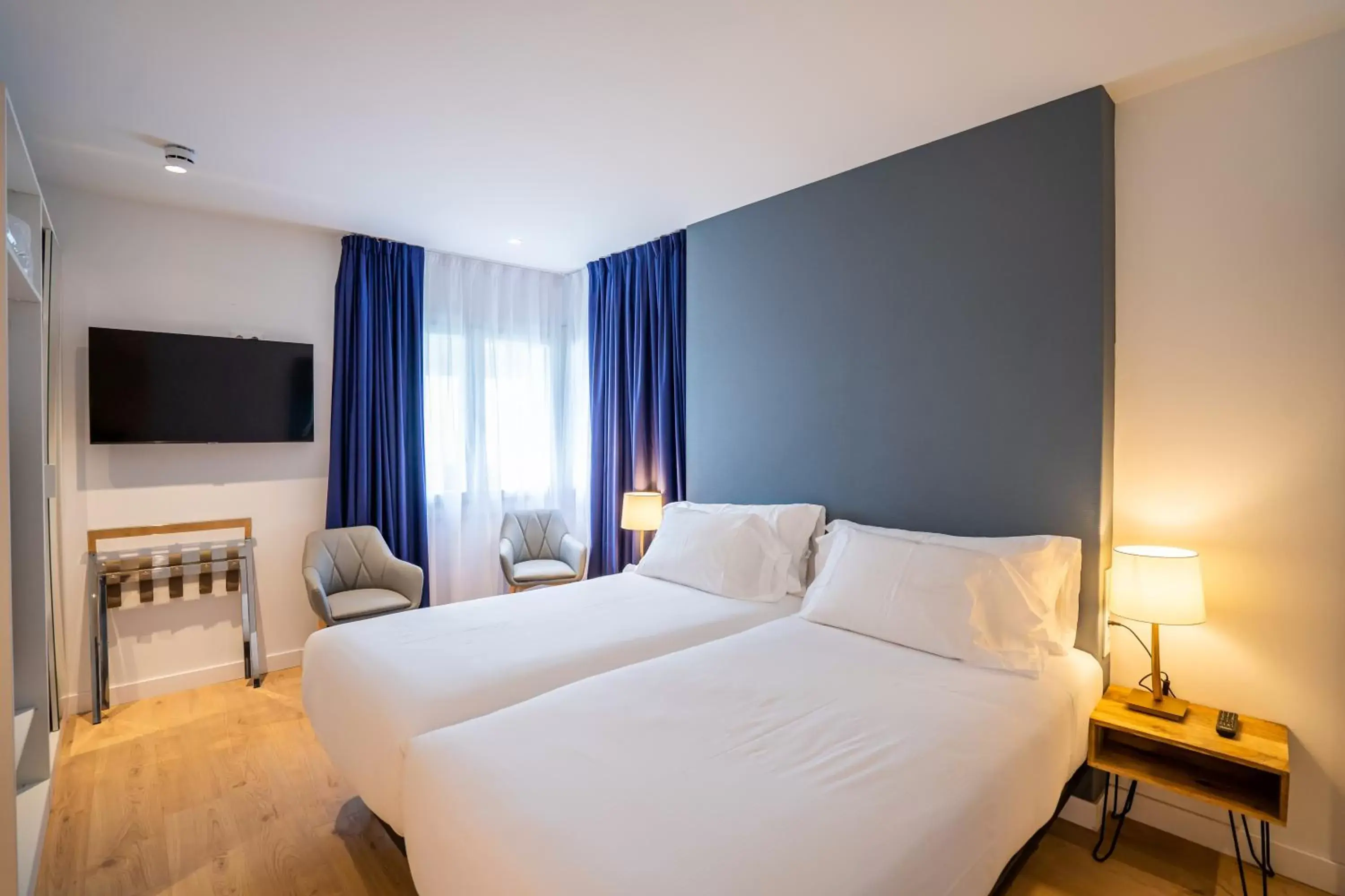 Photo of the whole room, Bed in abba Apartments Playa de Gros San Sebastián