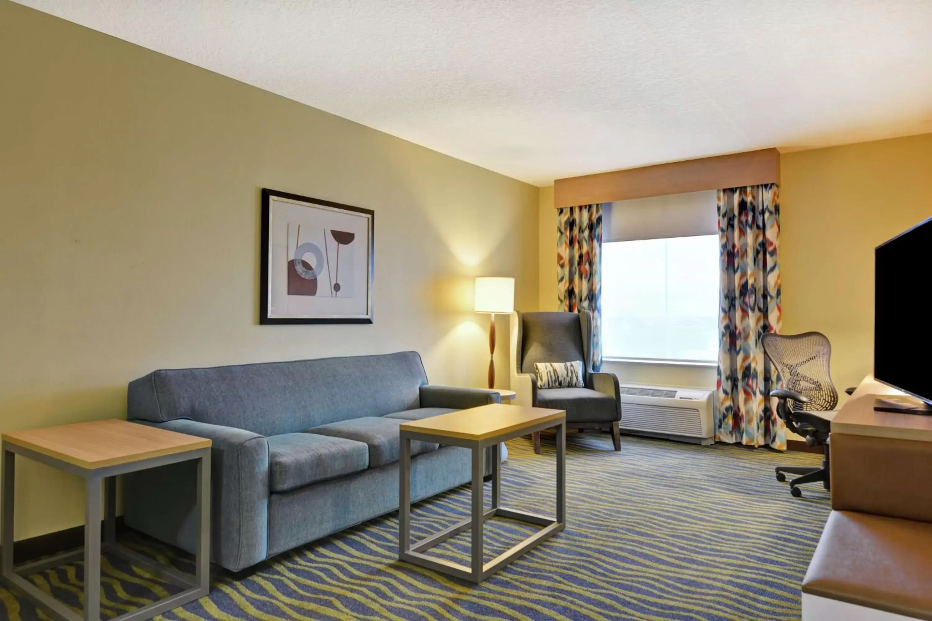Bedroom, Seating Area in Hilton Garden Inn Orlando Lake Buena Vista