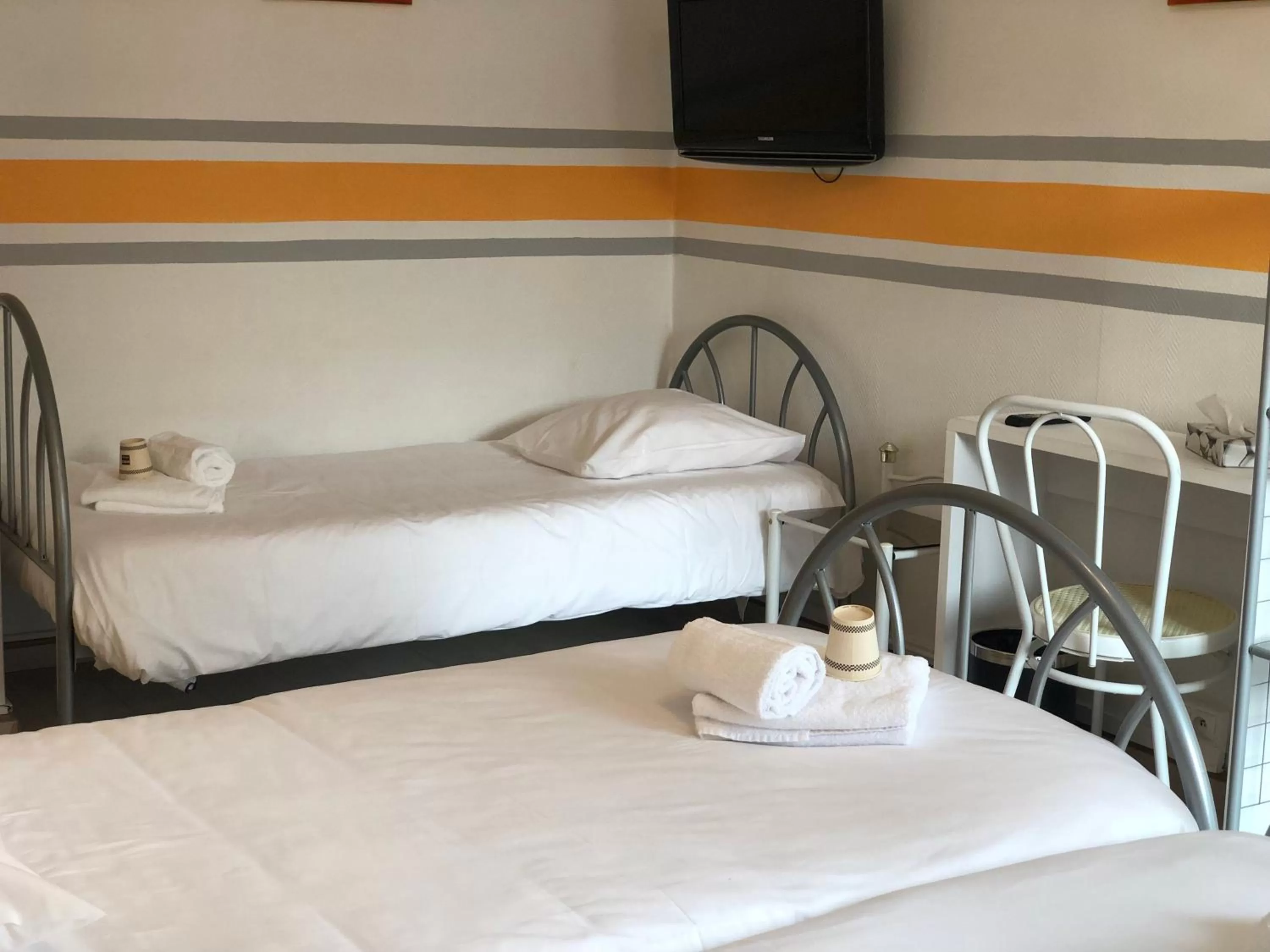 Bed in Enzo Hotels Neufchâteau by Kyriad Direct