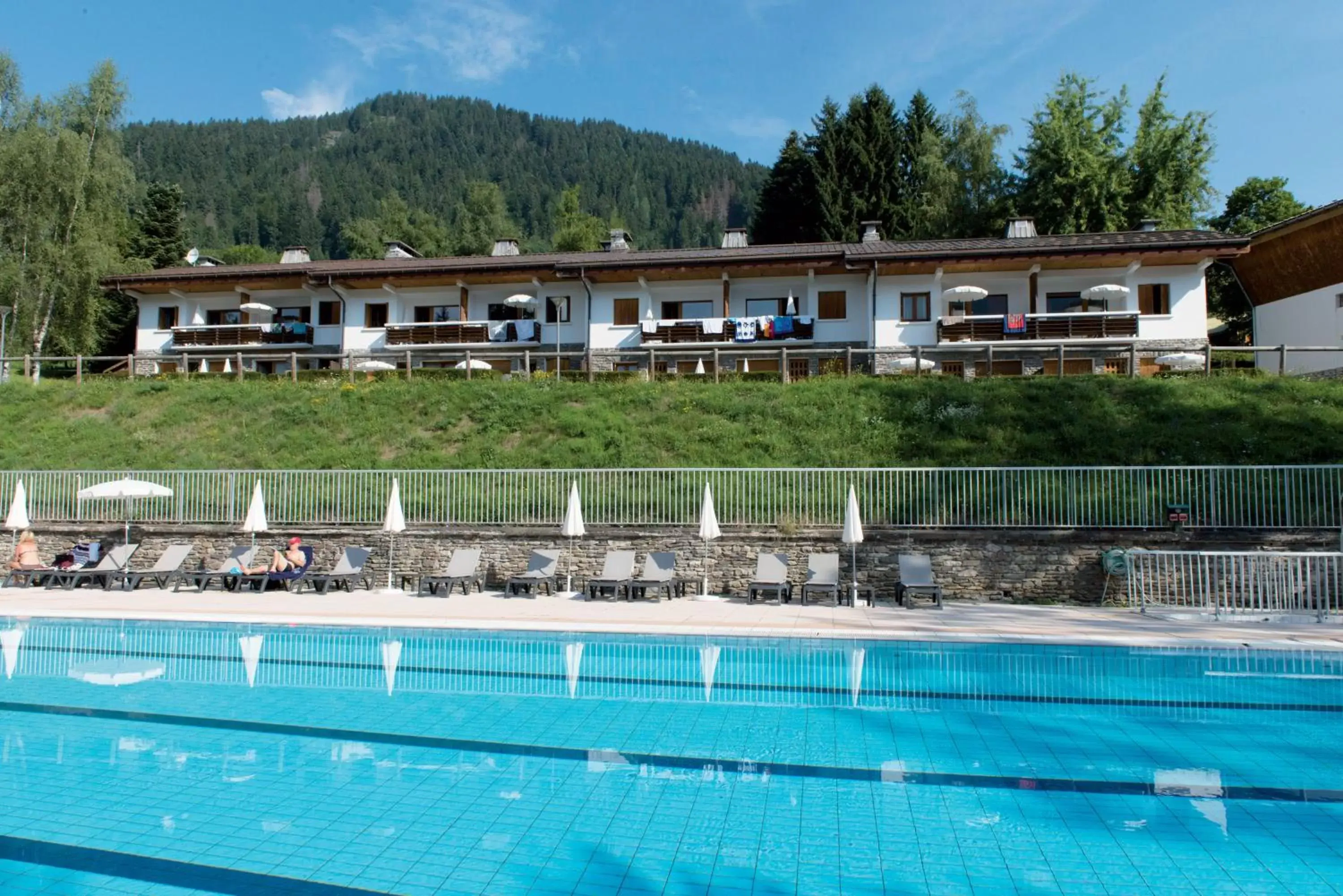 Pool view, Property Building in Hôtel Vacances Bleues Les Chalets du Prariand