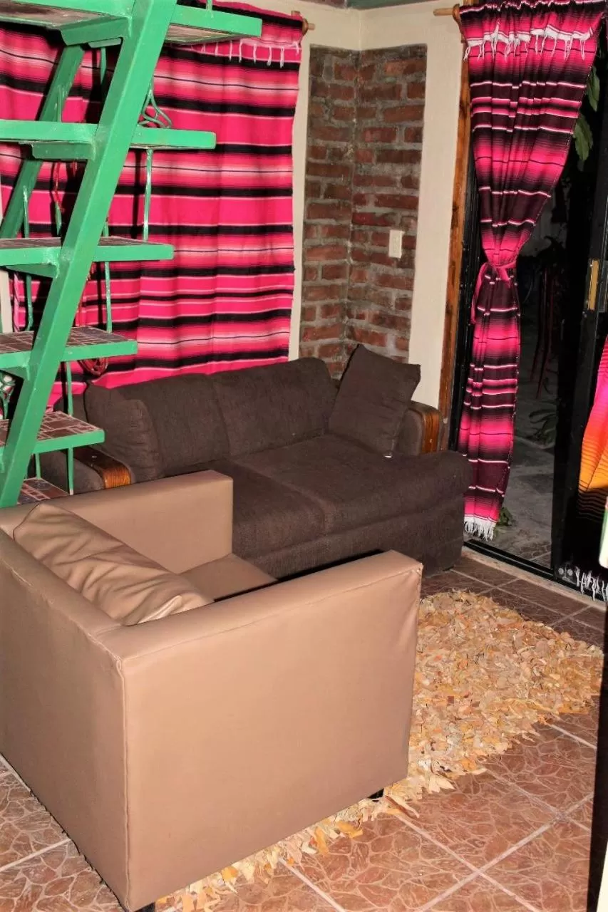 Living room in Cabañas Rústicas El Benny by Rotamundos