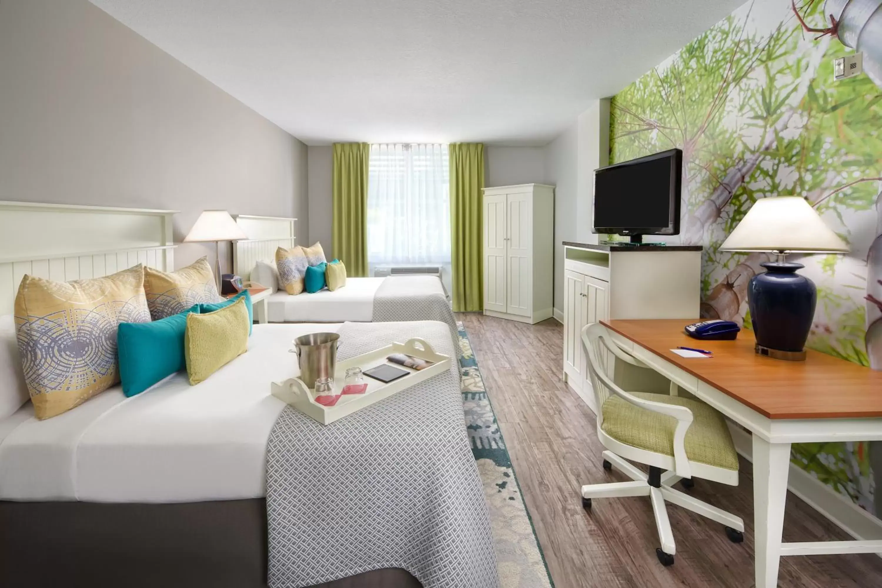 Photo of the whole room, TV/Entertainment Center in Hotel Indigo - Sarasota, an IHG Hotel