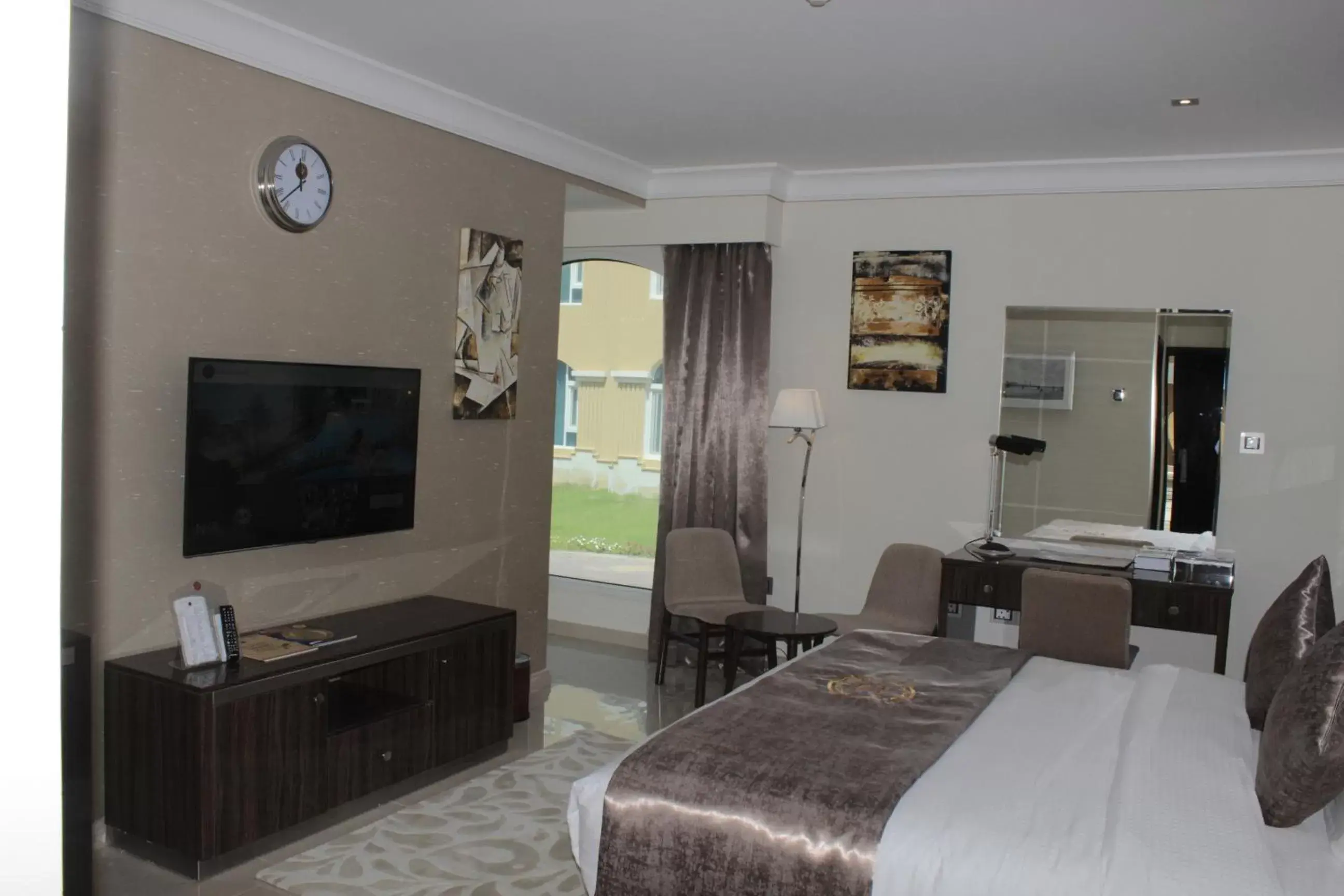 Photo of the whole room, TV/Entertainment Center in Al Sultan Beach Resort